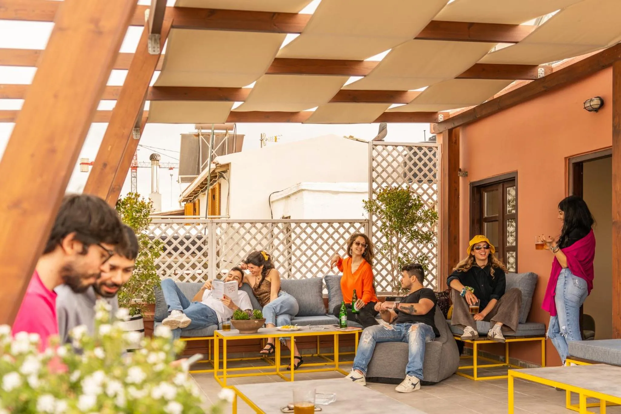 Communal lounge/ TV room in Intra Muros Hostel