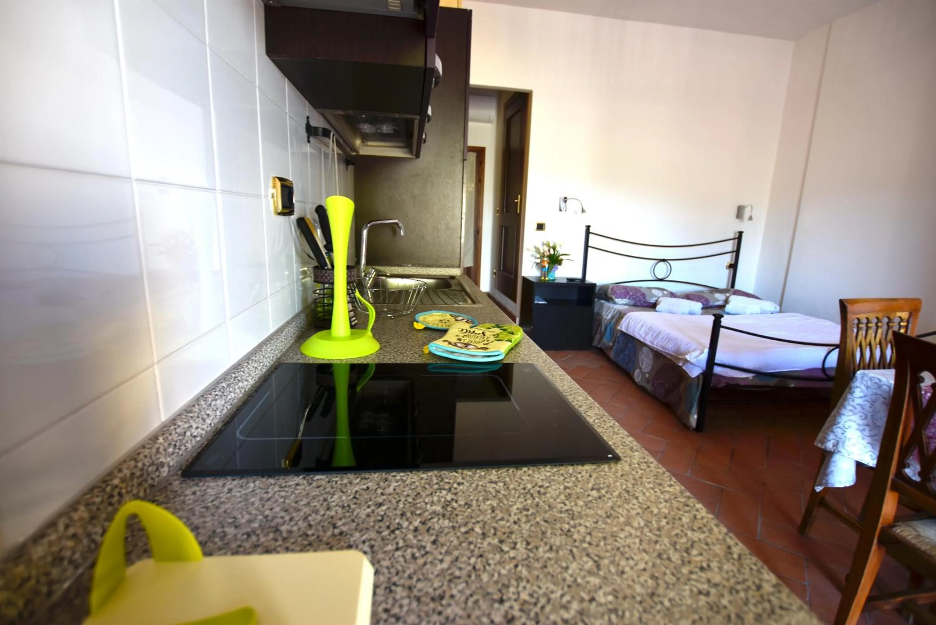 Kitchen or kitchenette, Bed in La Valle di Anna