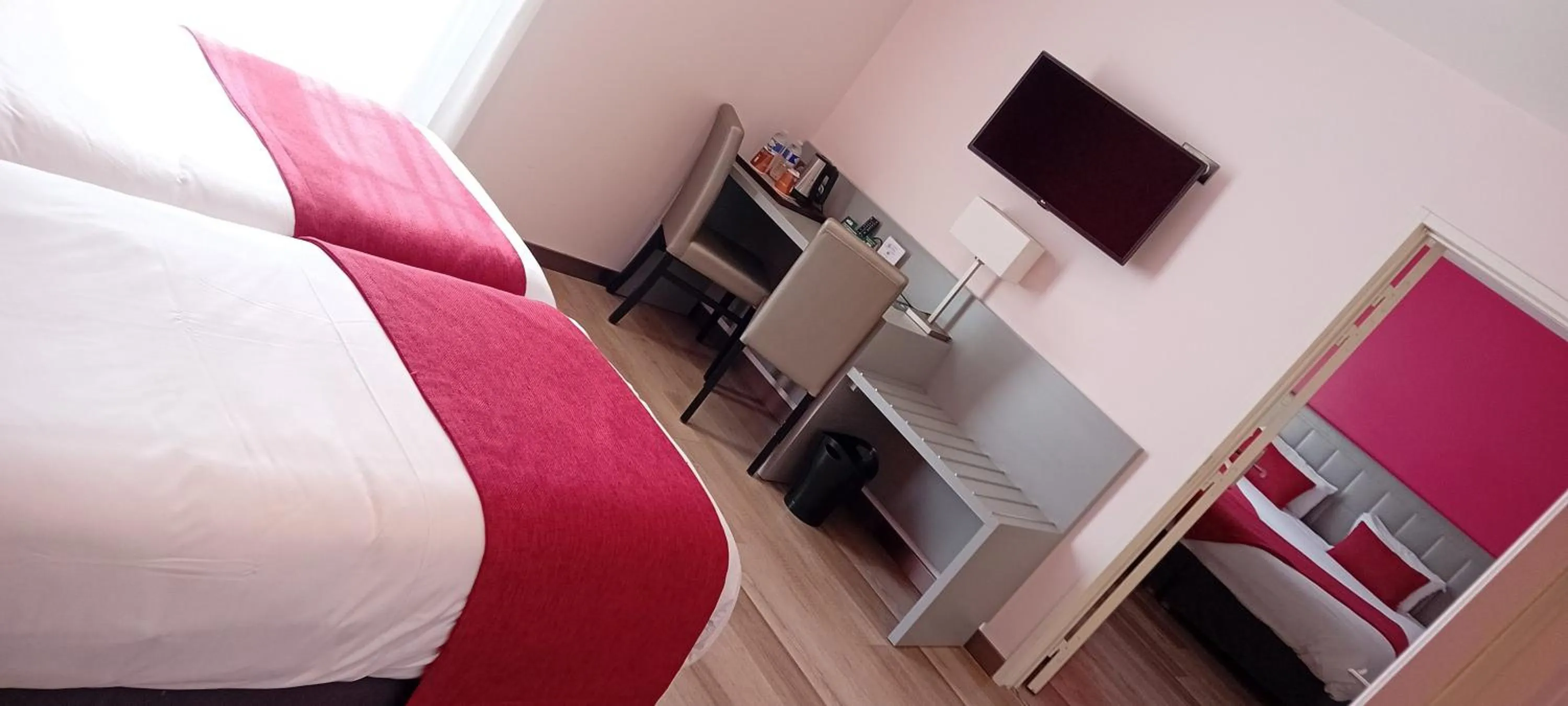 Bed in Logis Hôtel Restaurant Le Moulin de la Coudre