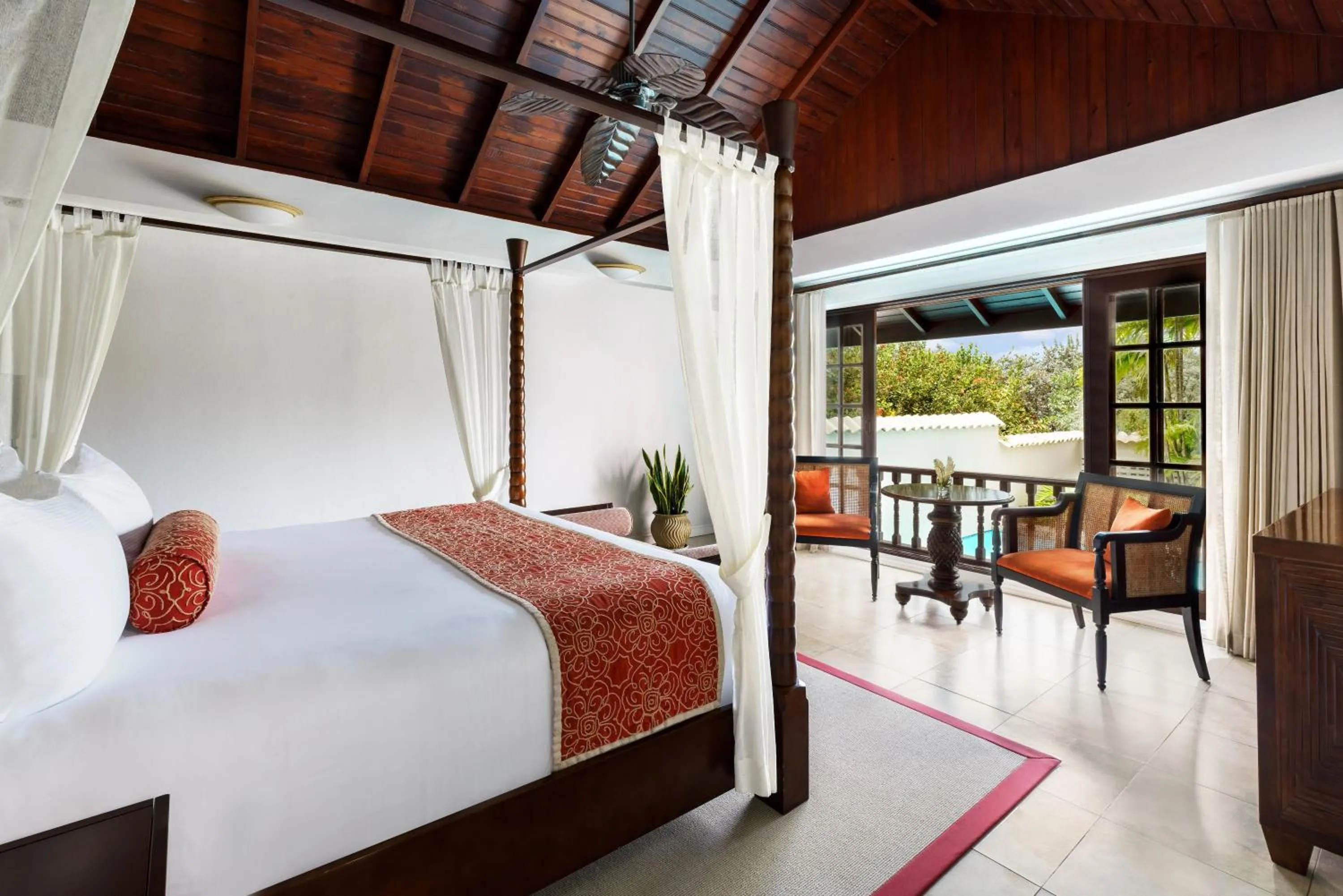 Seating area, Bed in Spice Island Beach Resort