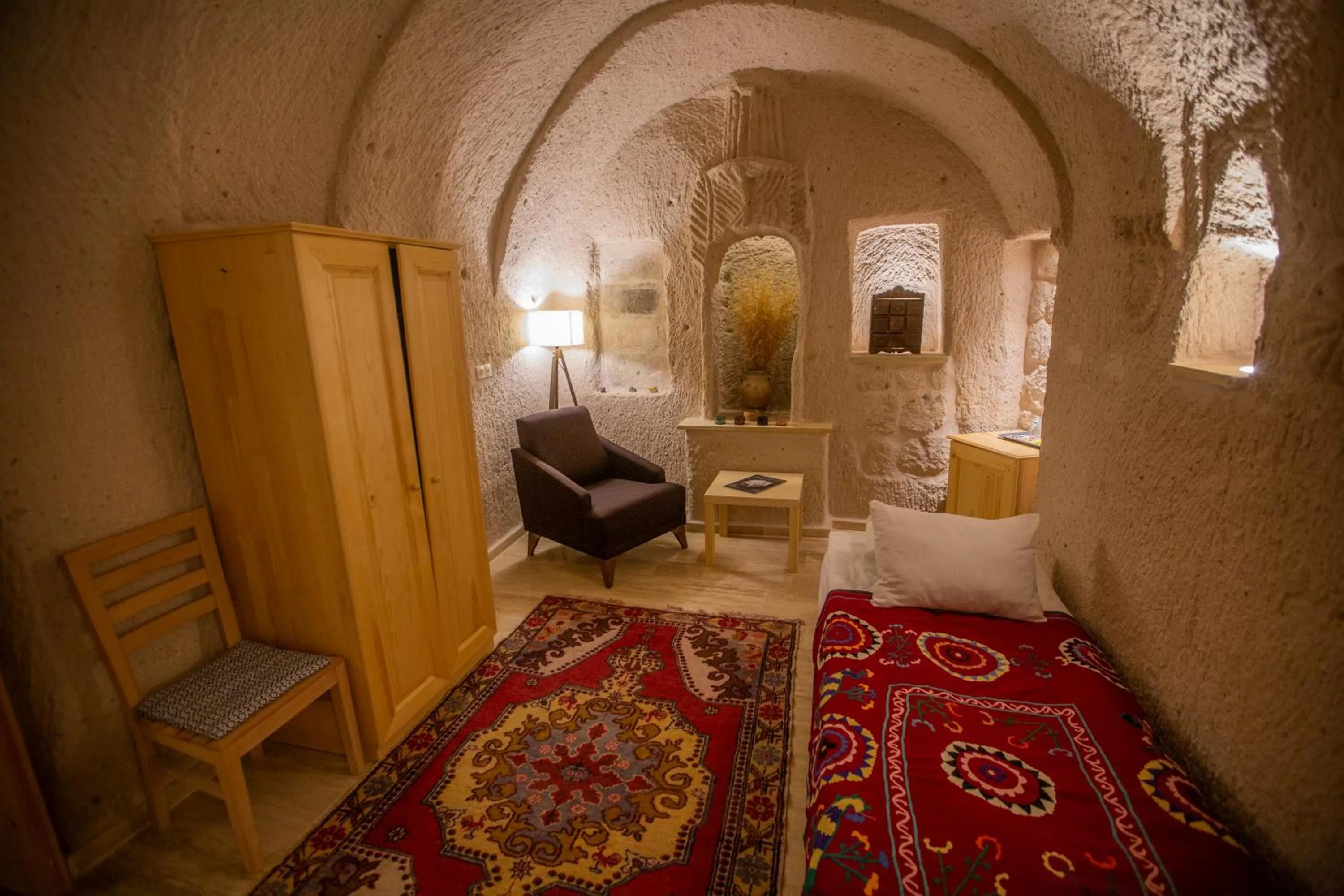Seating area, Bed in Maze Of Cappadocia Hotel