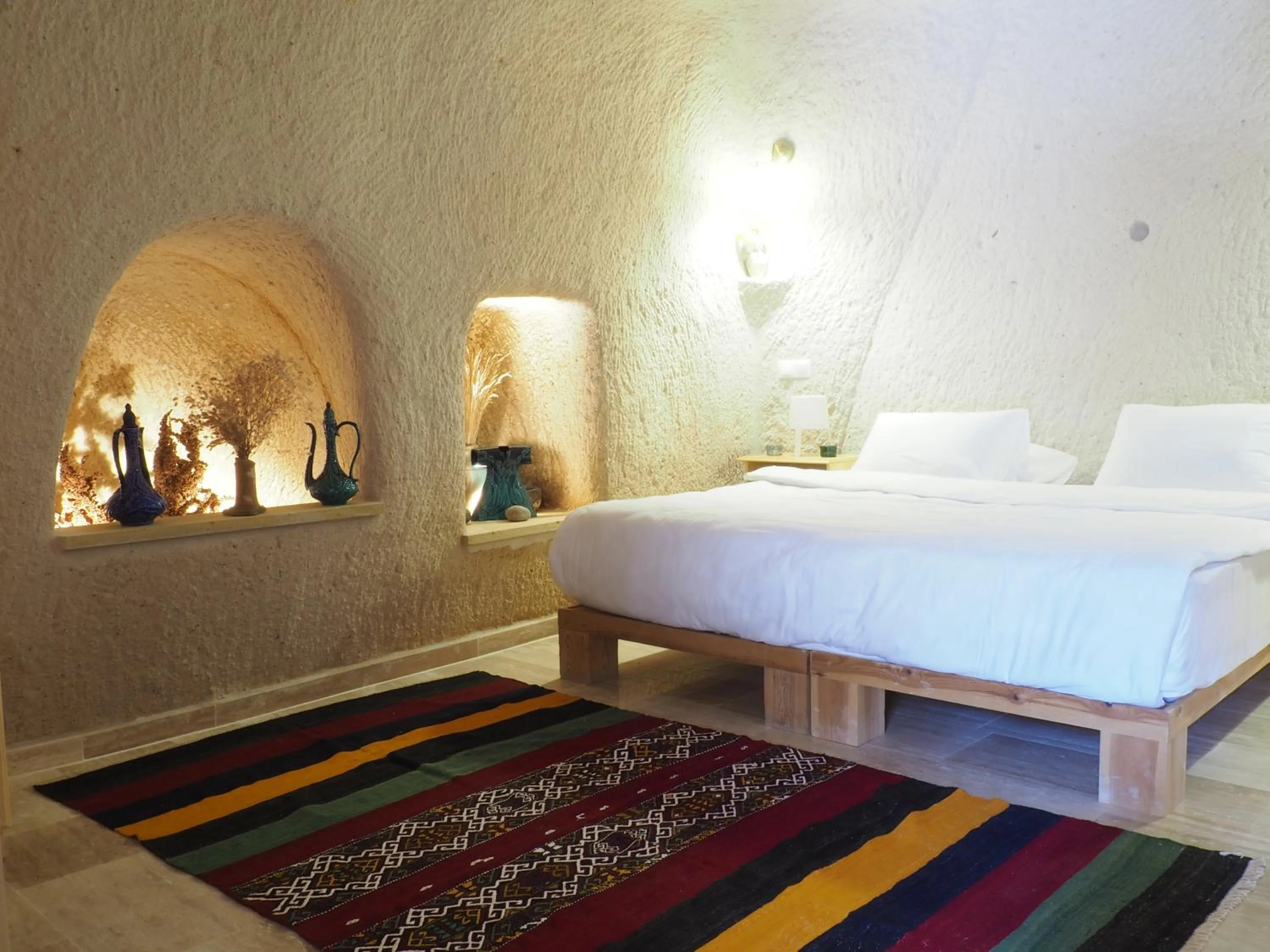 Bed in Maze Of Cappadocia Hotel