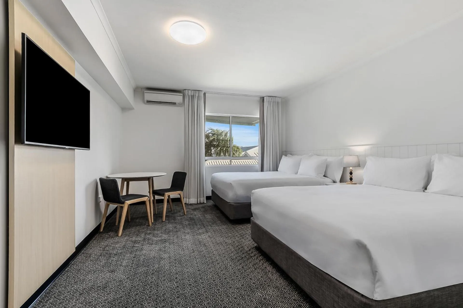 Bed in The Leea Resort Darwin