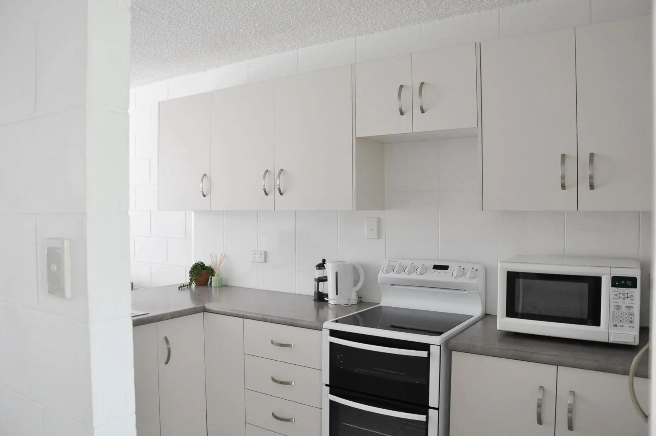 Kitchen or kitchenette in Palm Waters Holiday Villas