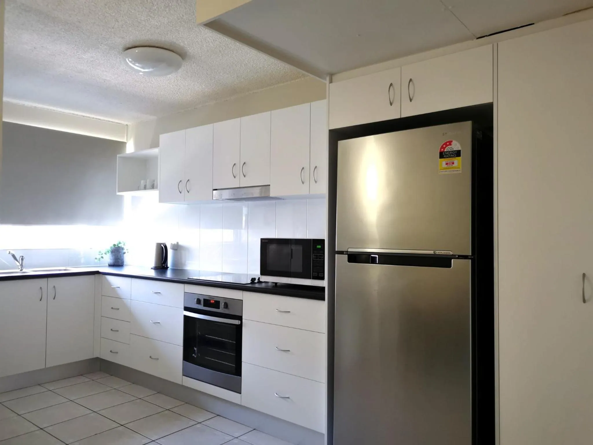 Kitchen or kitchenette in Palm Waters Holiday Villas