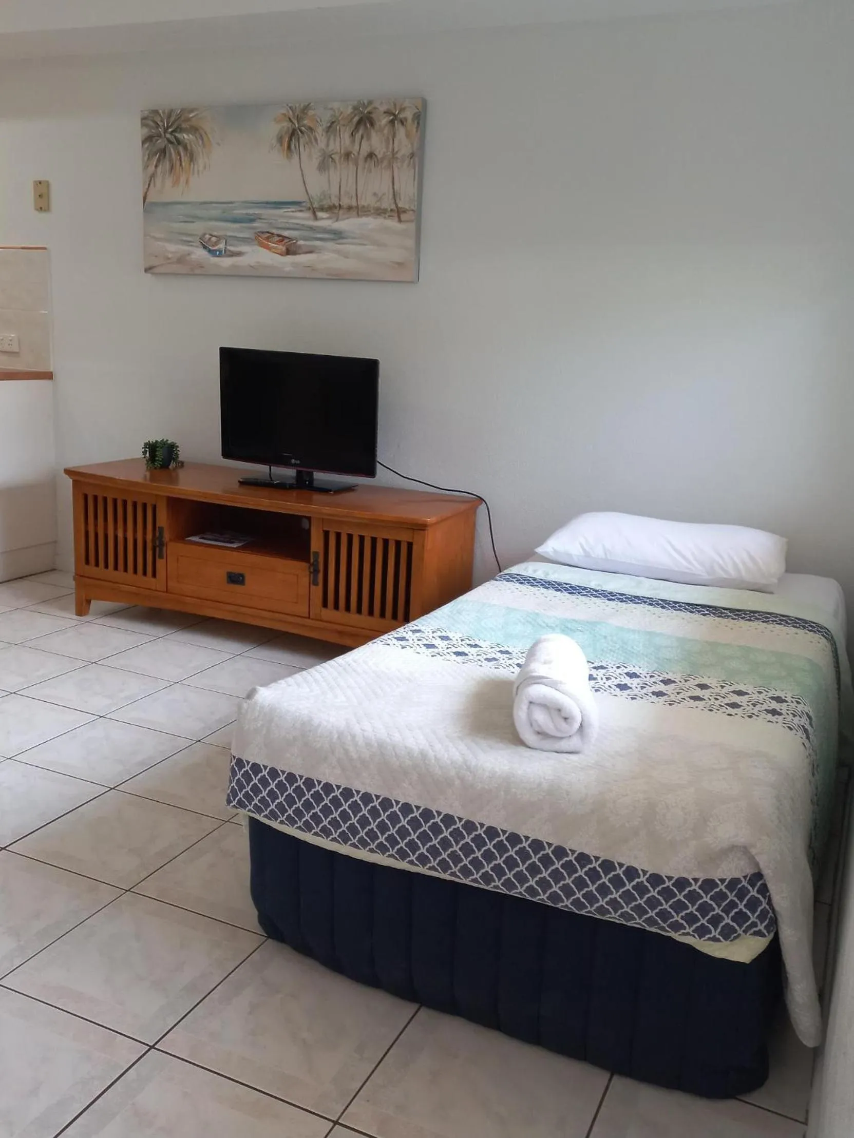 Bed in Palm Waters Holiday Villas