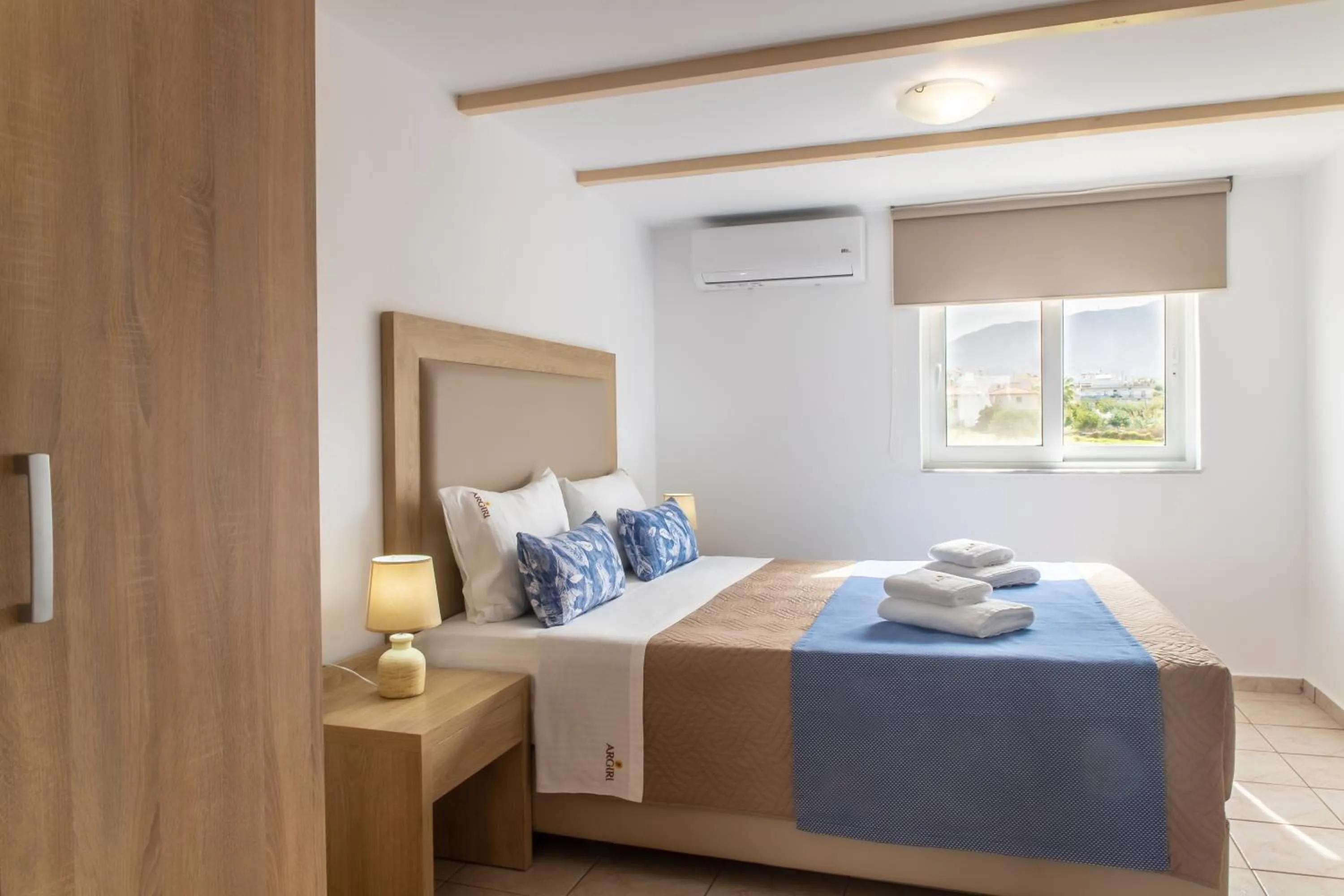 Bed in Argiri Apartments & Suites