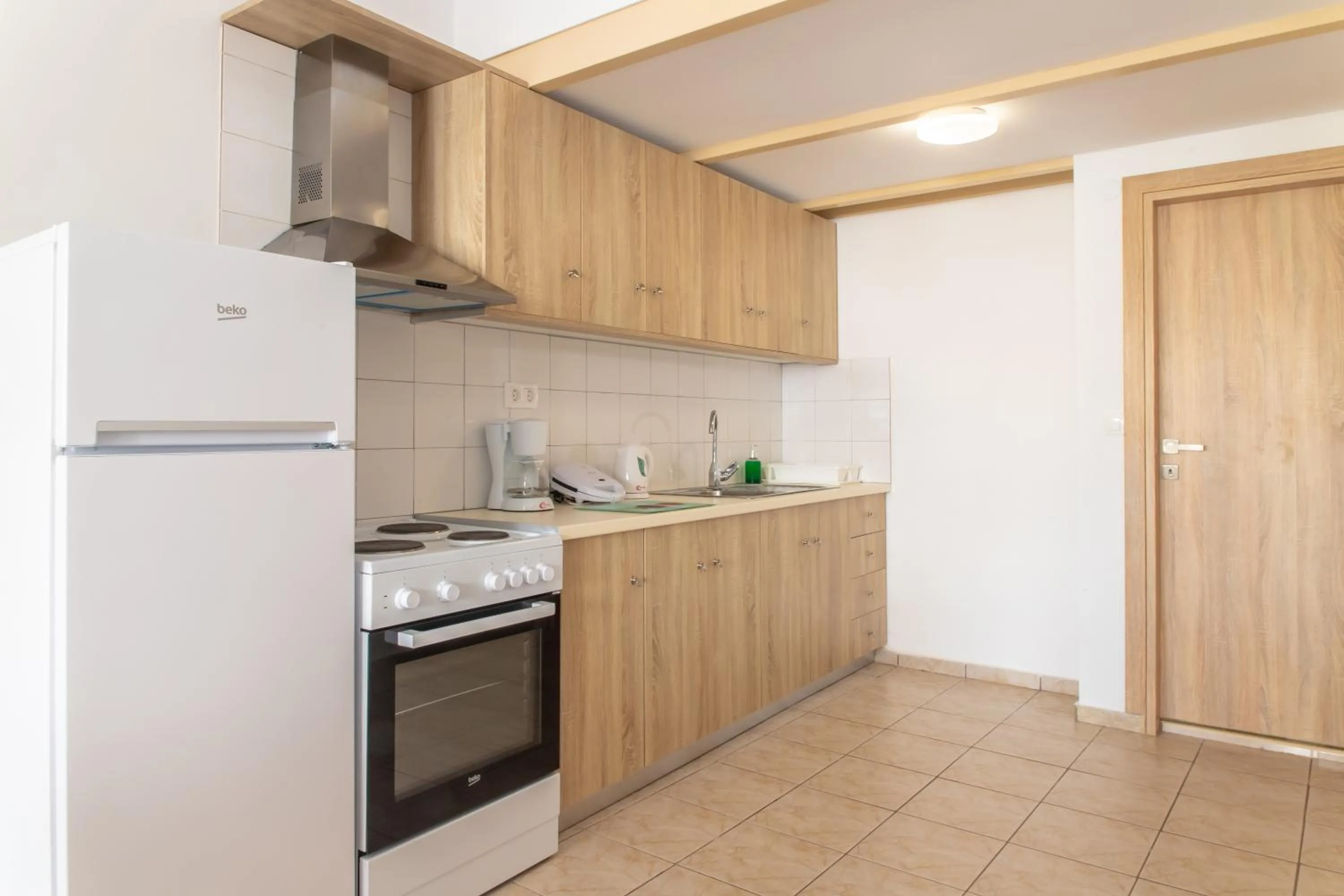 Kitchen or kitchenette in Argiri Apartments & Suites