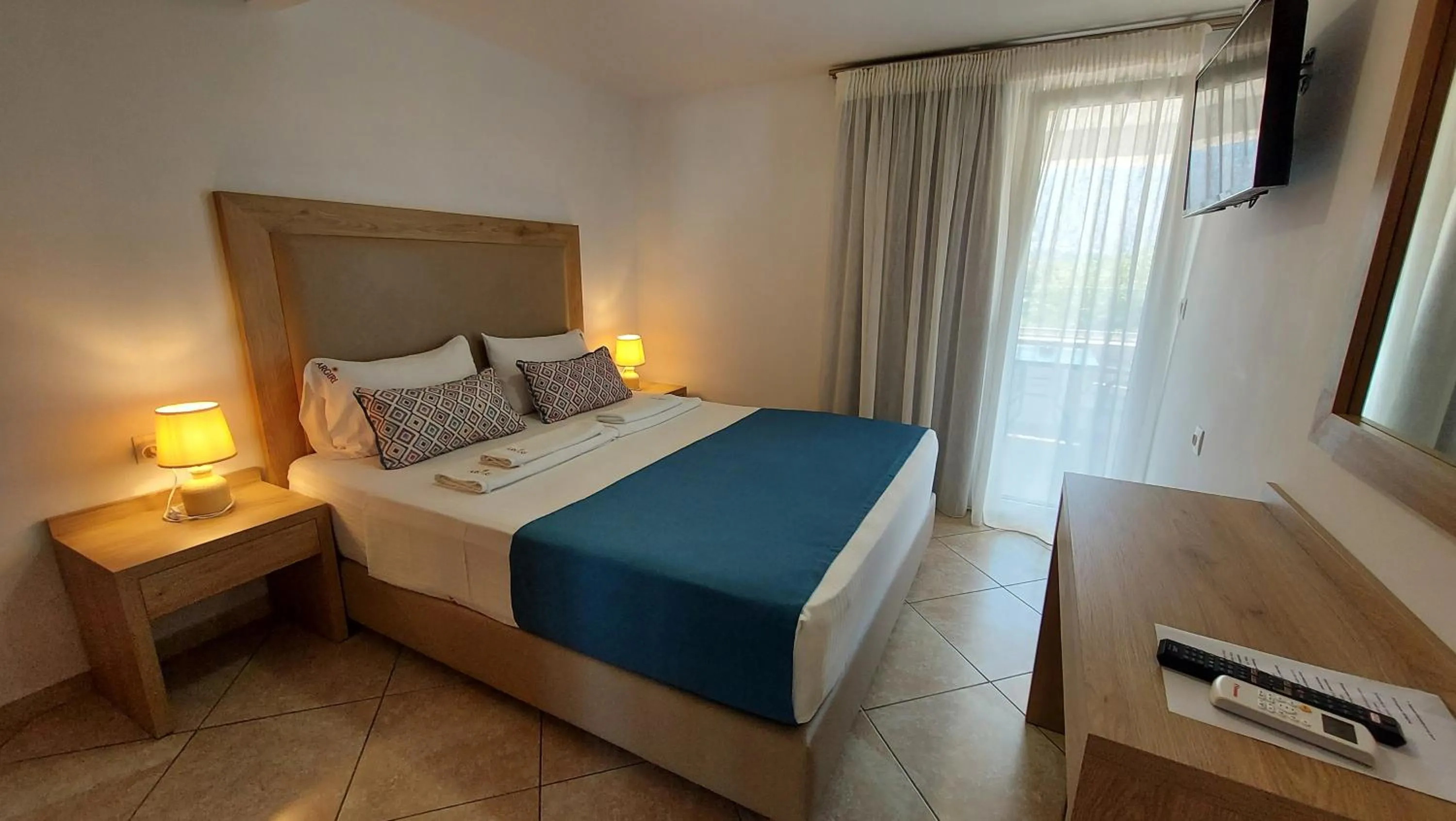 Bed in Argiri Apartments & Suites