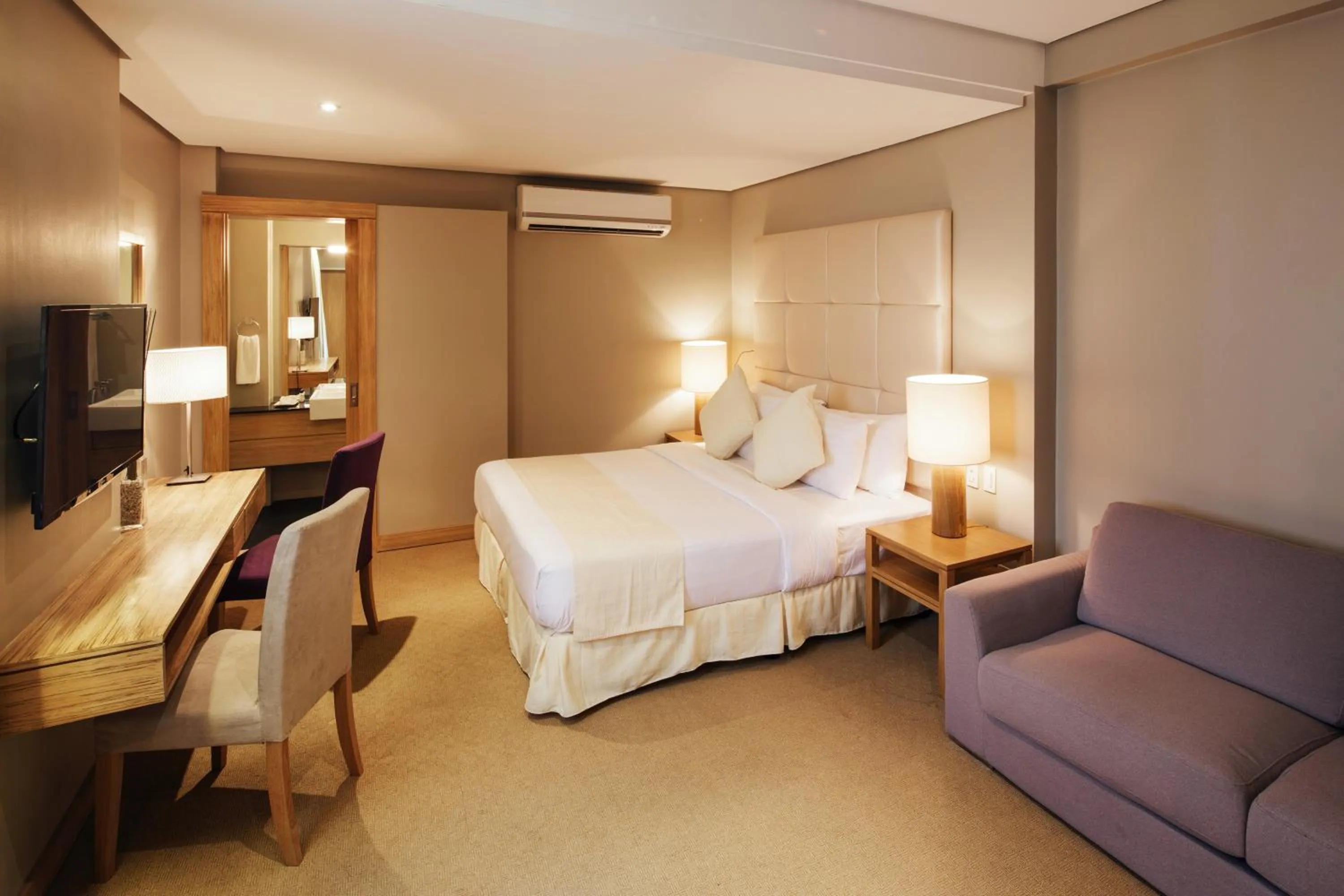 Bed in Villa Caemilla Beach Boutique Hotel