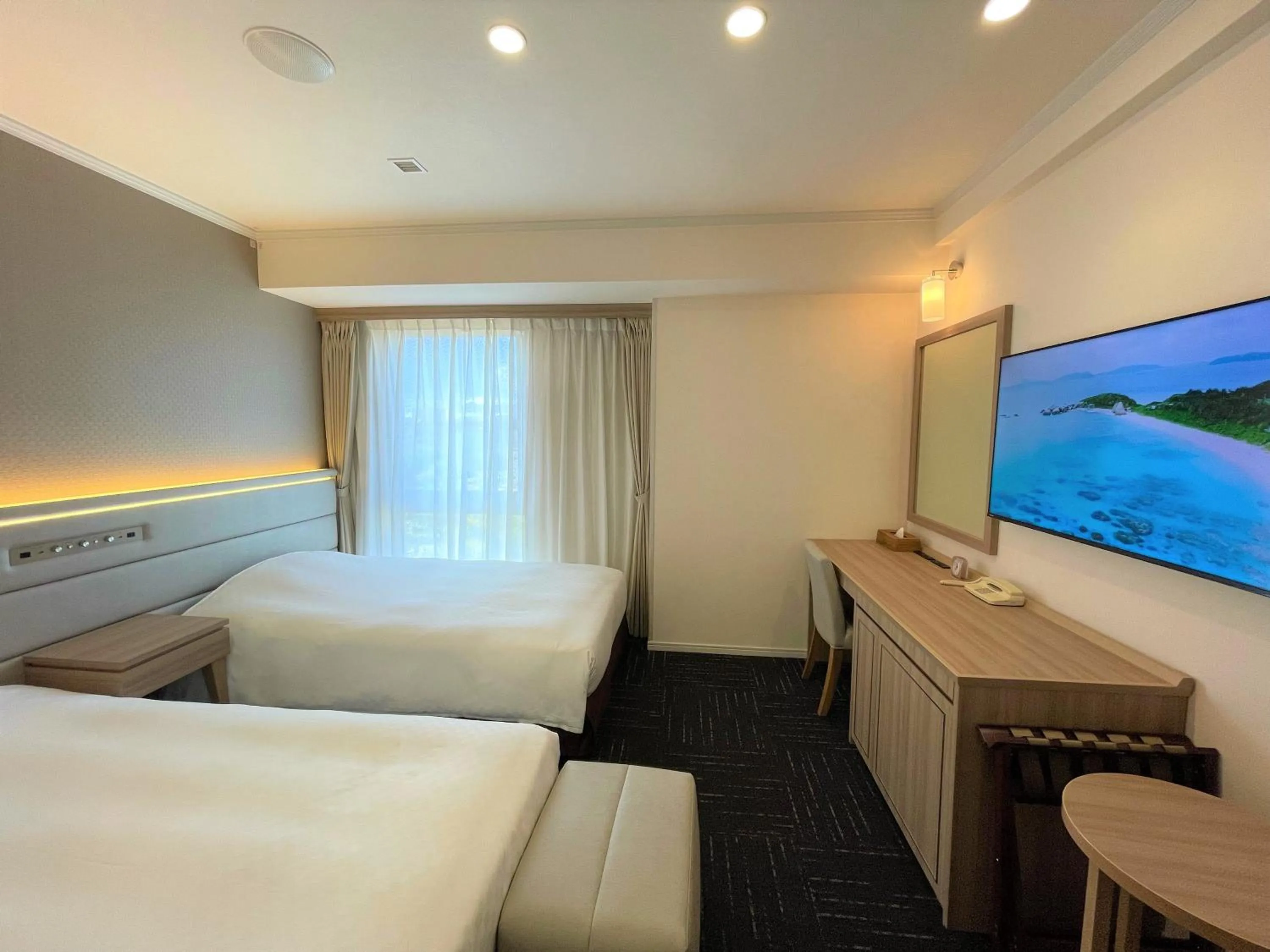 Bed in Libre Garden Hotel