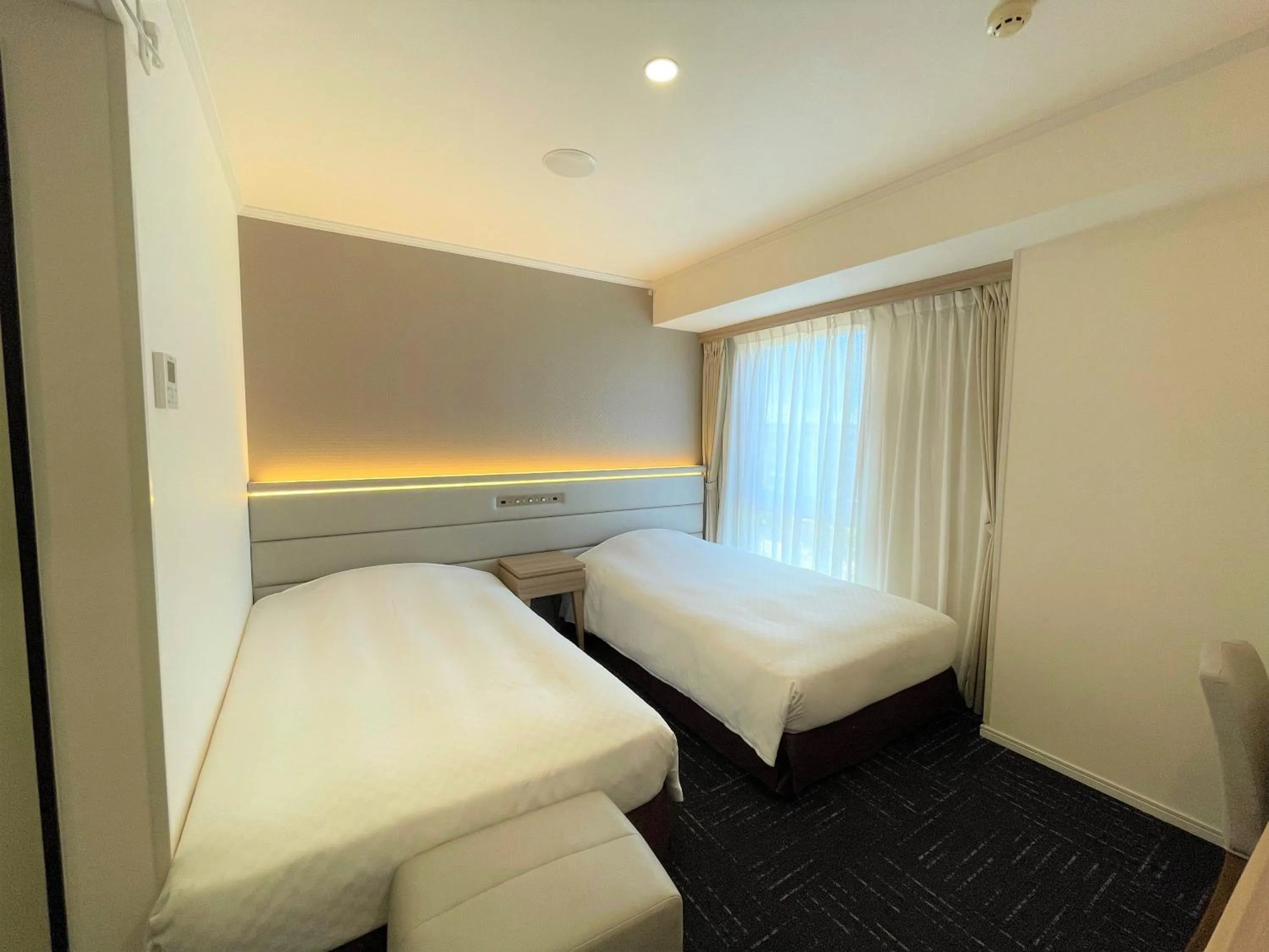 Bed in Libre Garden Hotel