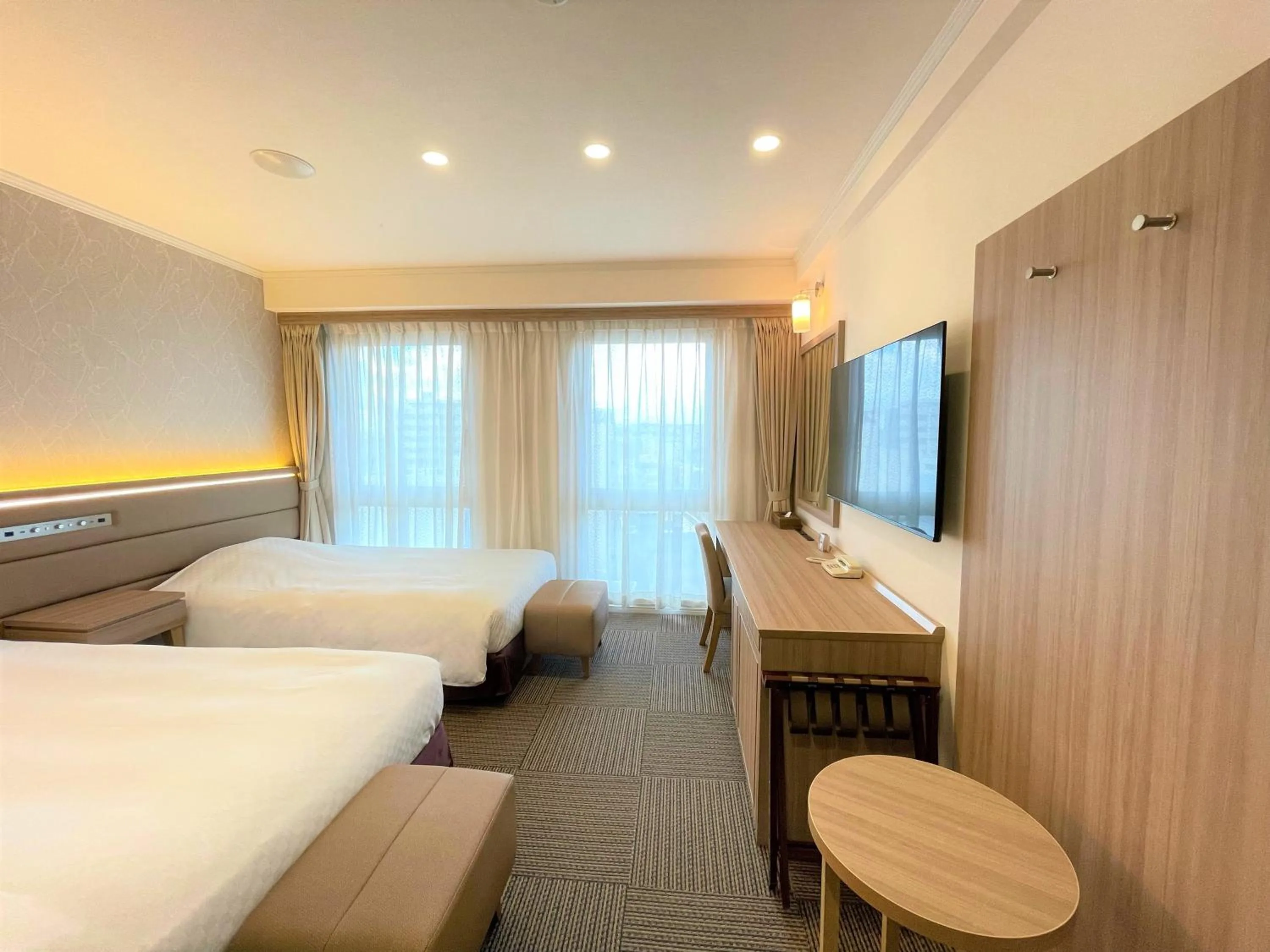 Bed in Libre Garden Hotel