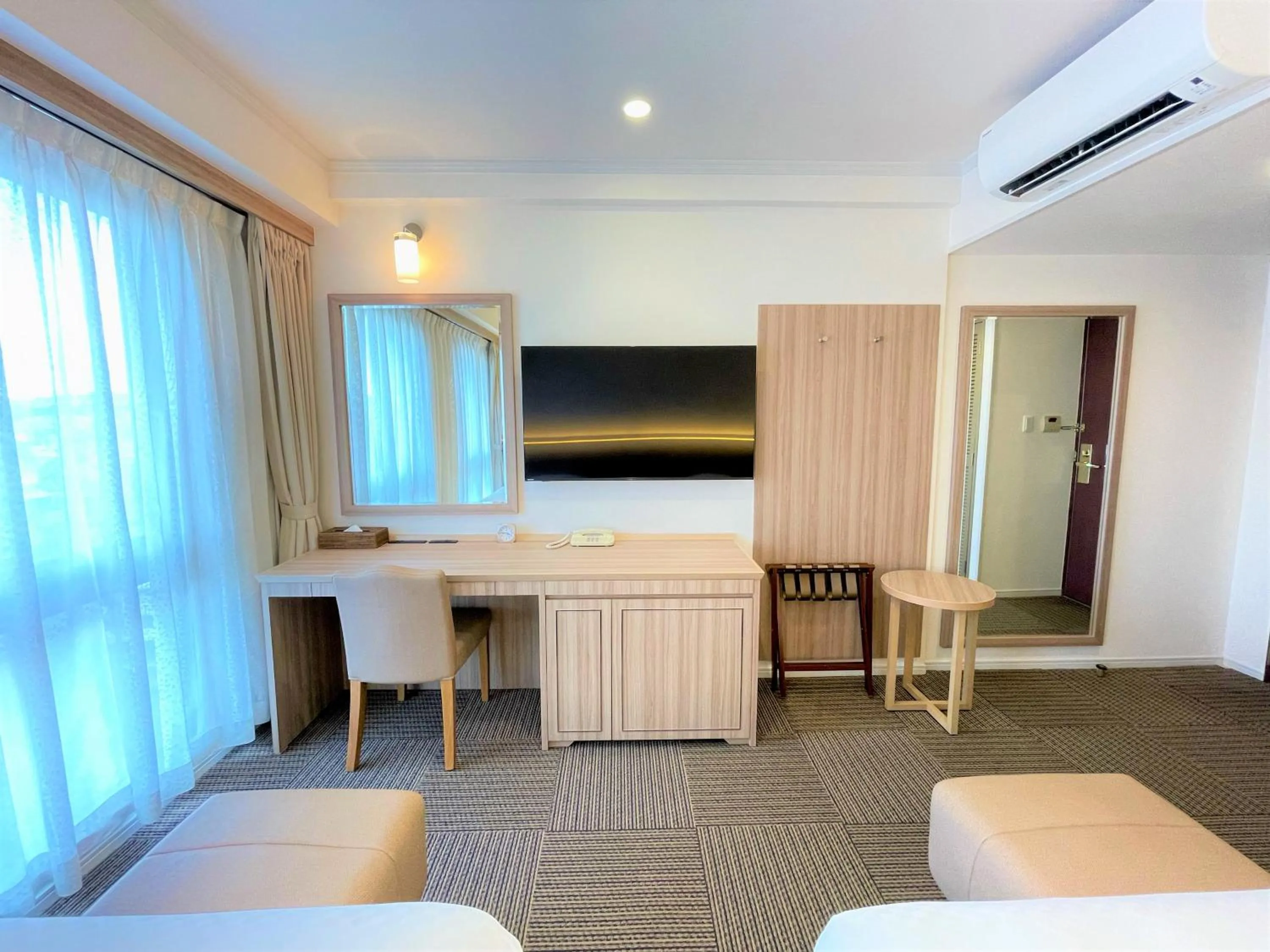 Bed in Libre Garden Hotel