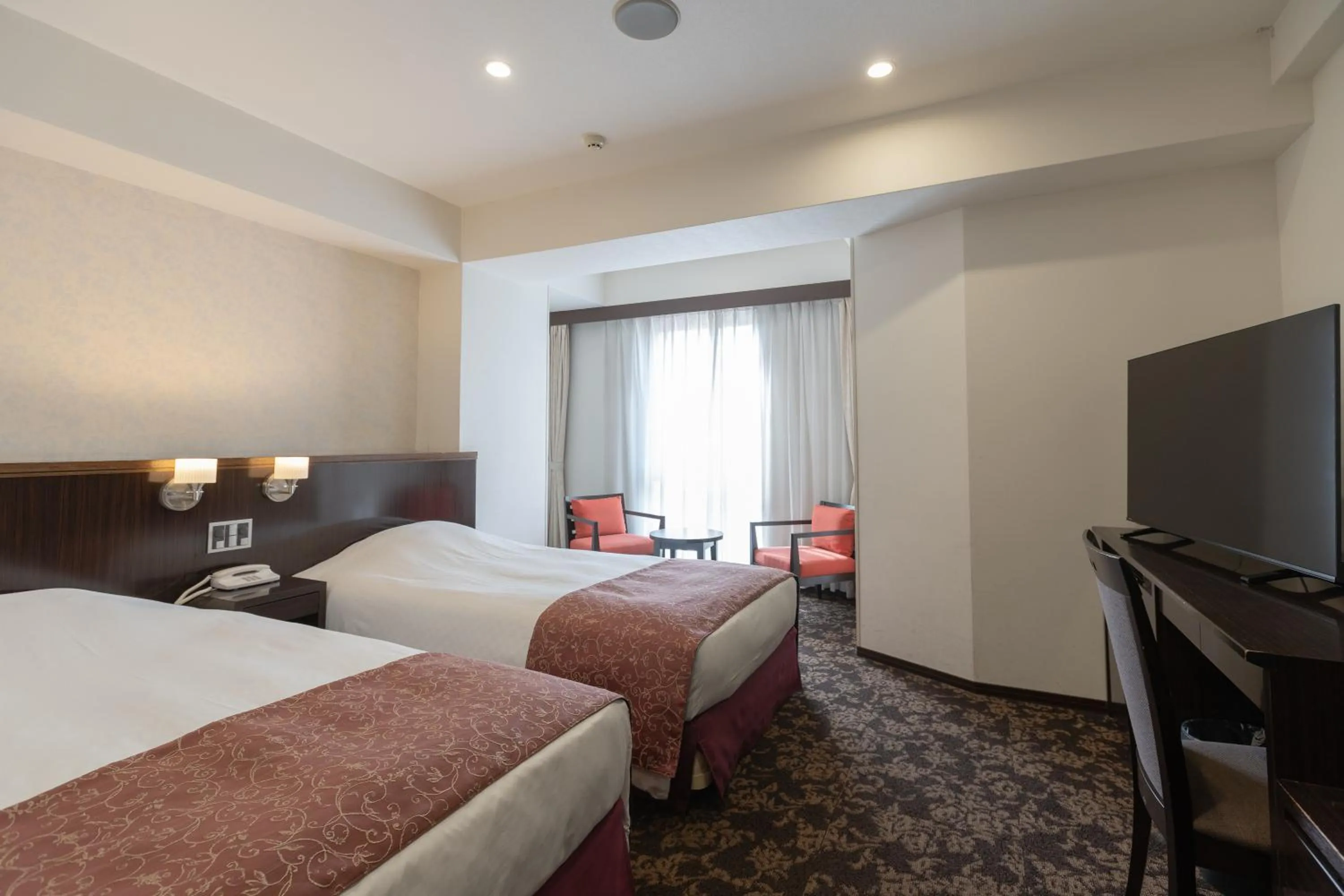 Bed in Libre Garden Hotel