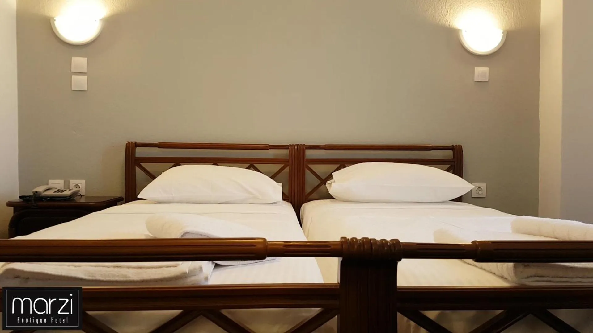Bed in Marzi Boutique Hotel