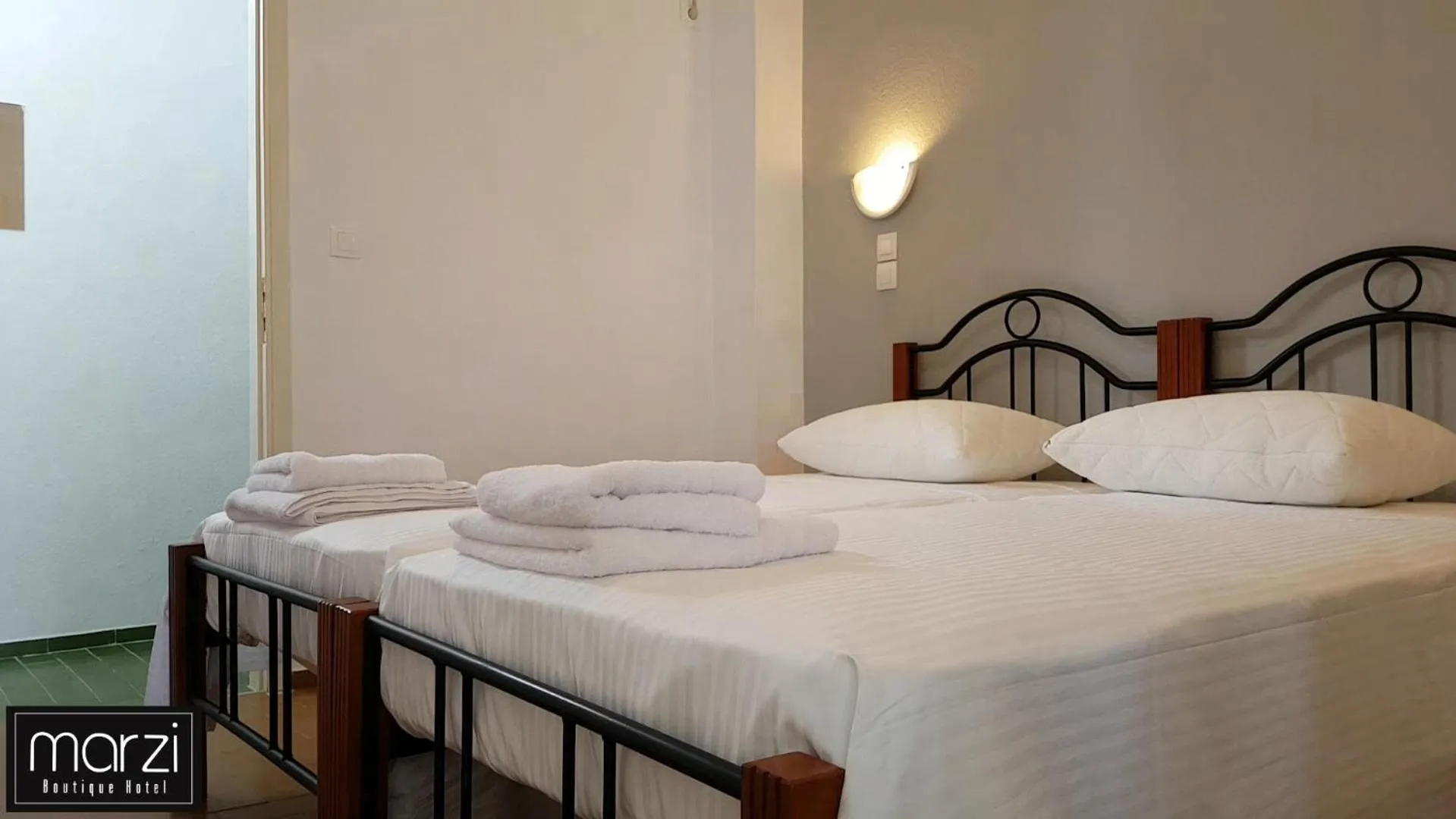 Bed in Marzi Boutique Hotel