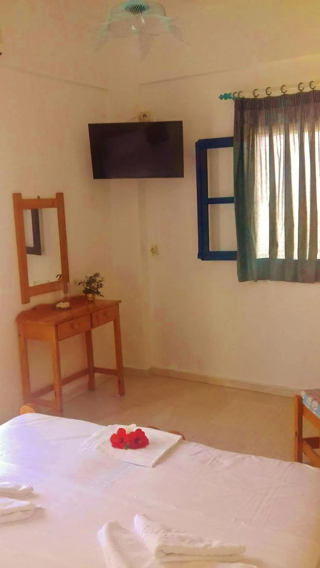 Bed in Apollonia Apartments