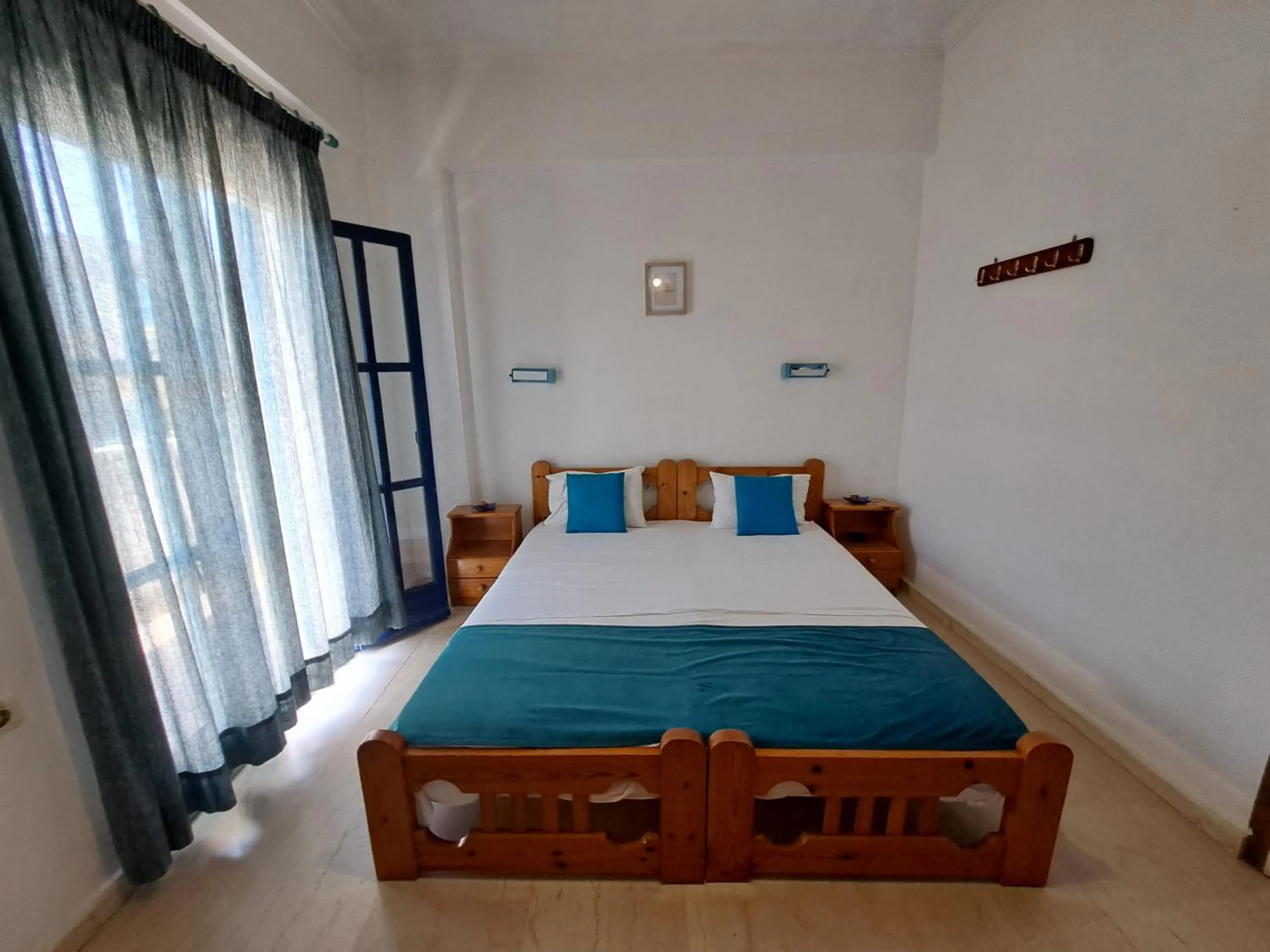 Bed in Apollonia Apartments