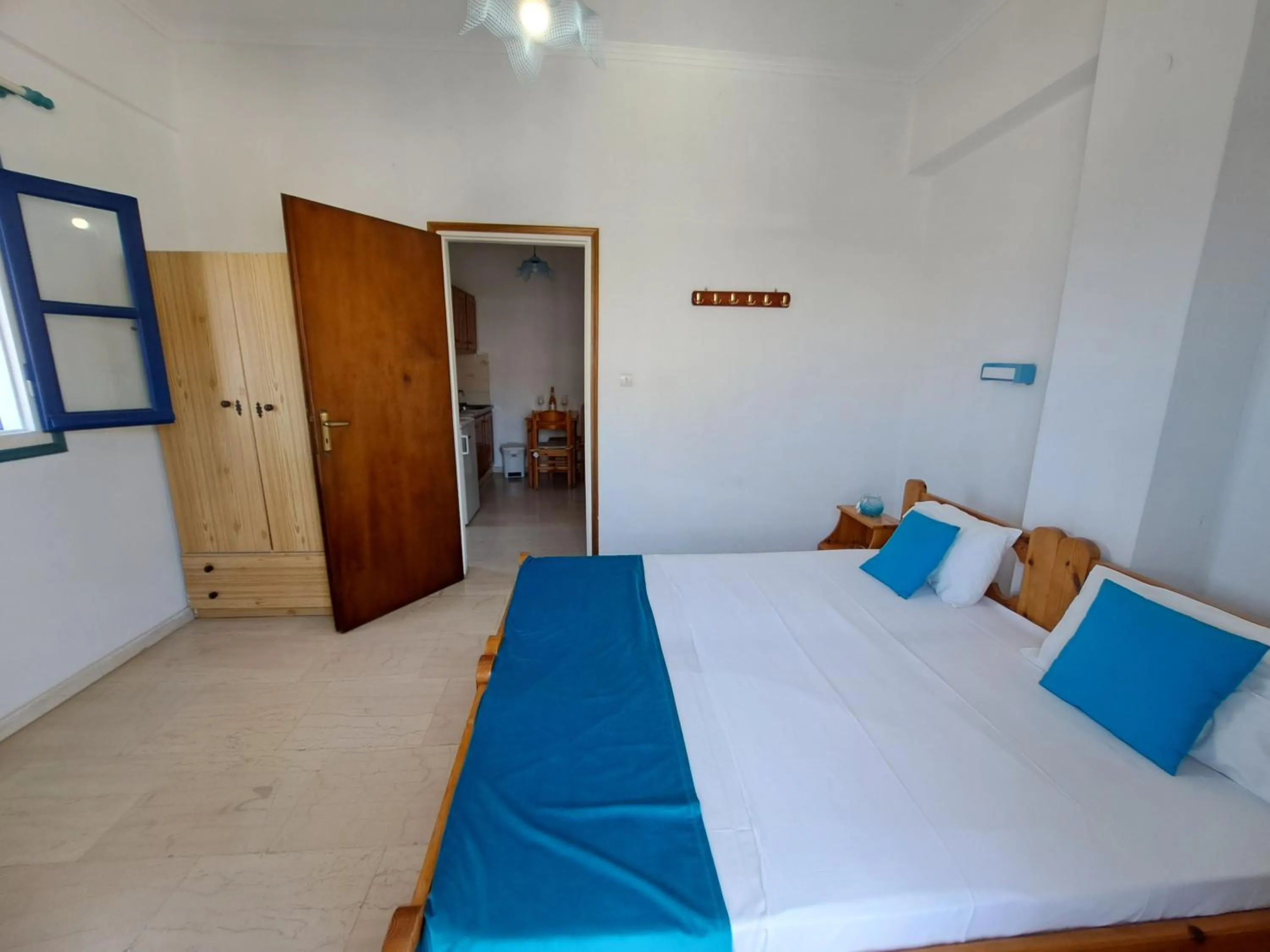 Bed in Apollonia Apartments