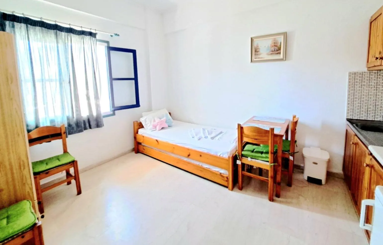Bed in Apollonia Apartments