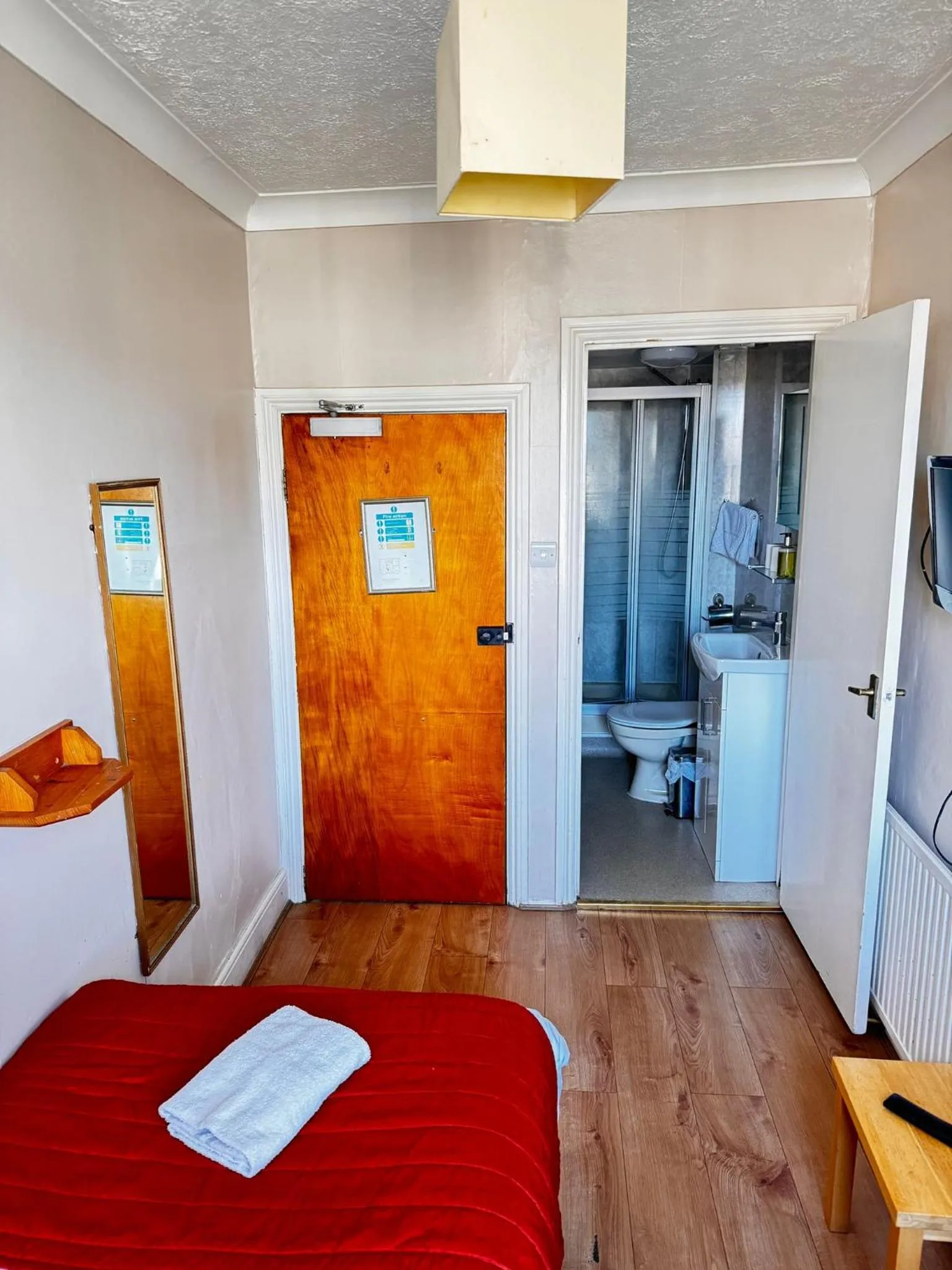 Bed in Ambassador Hotel