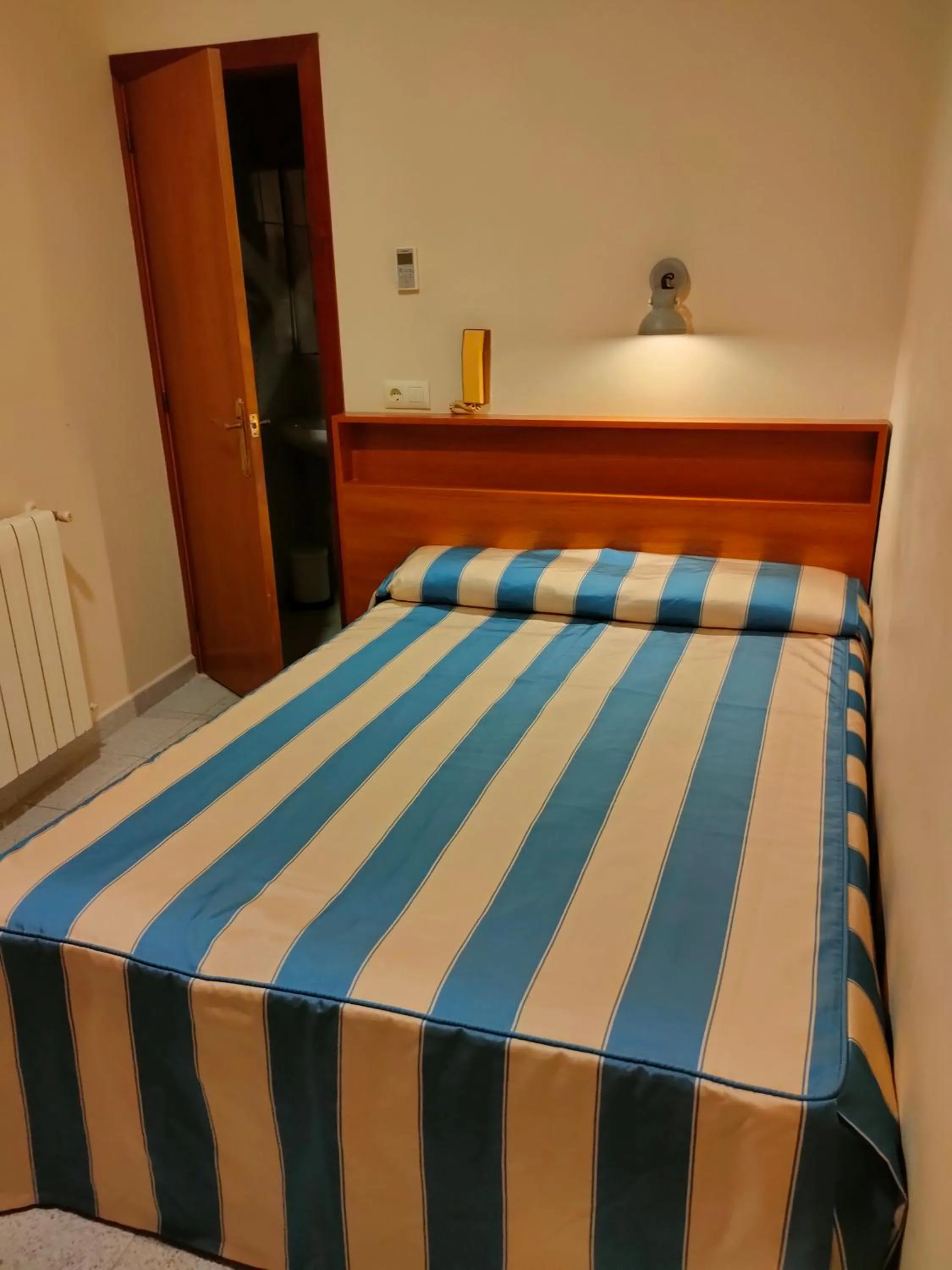 Bed in Pensión Coral