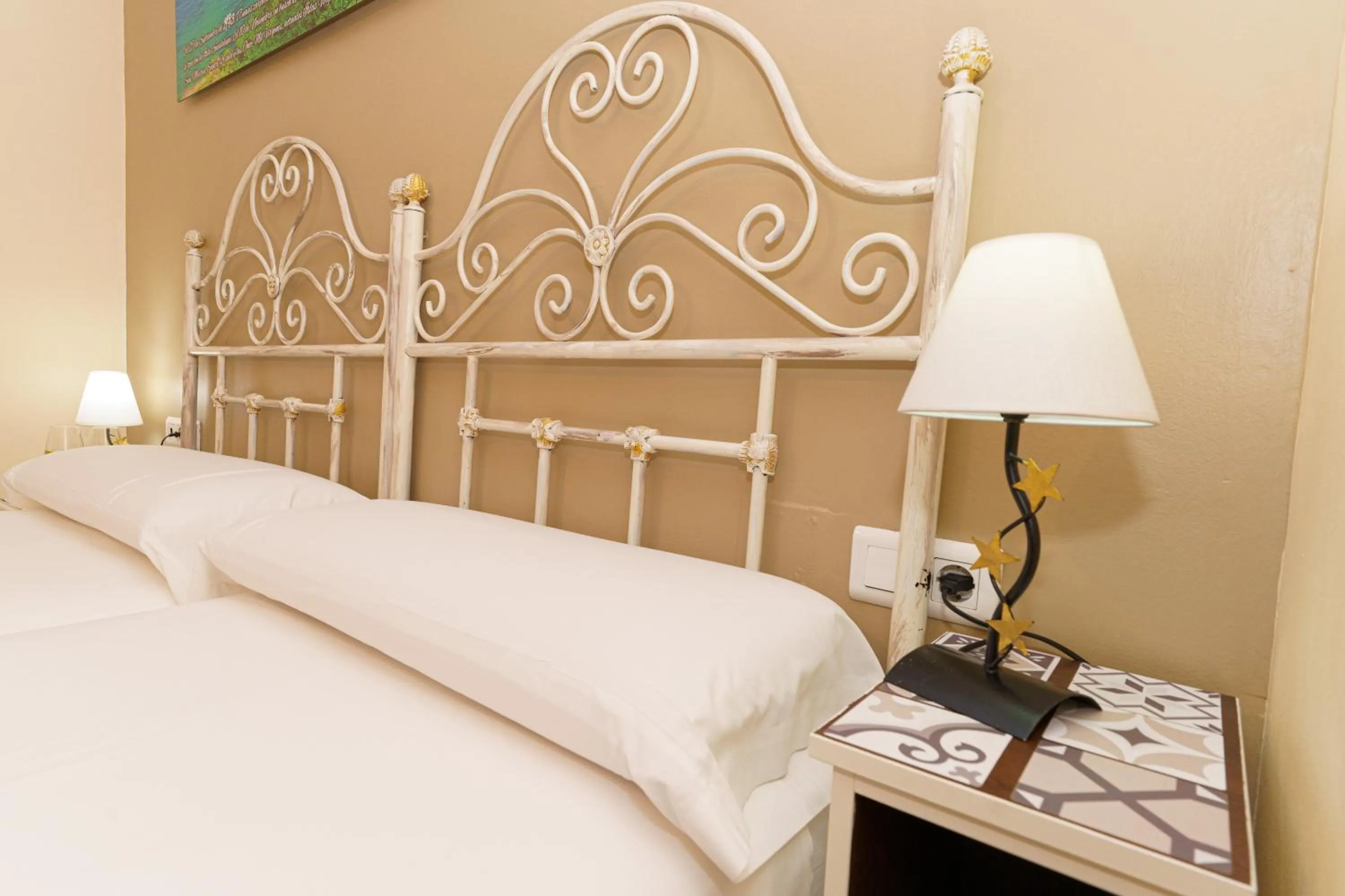 Decorative detail, Bed in Hotel Colón