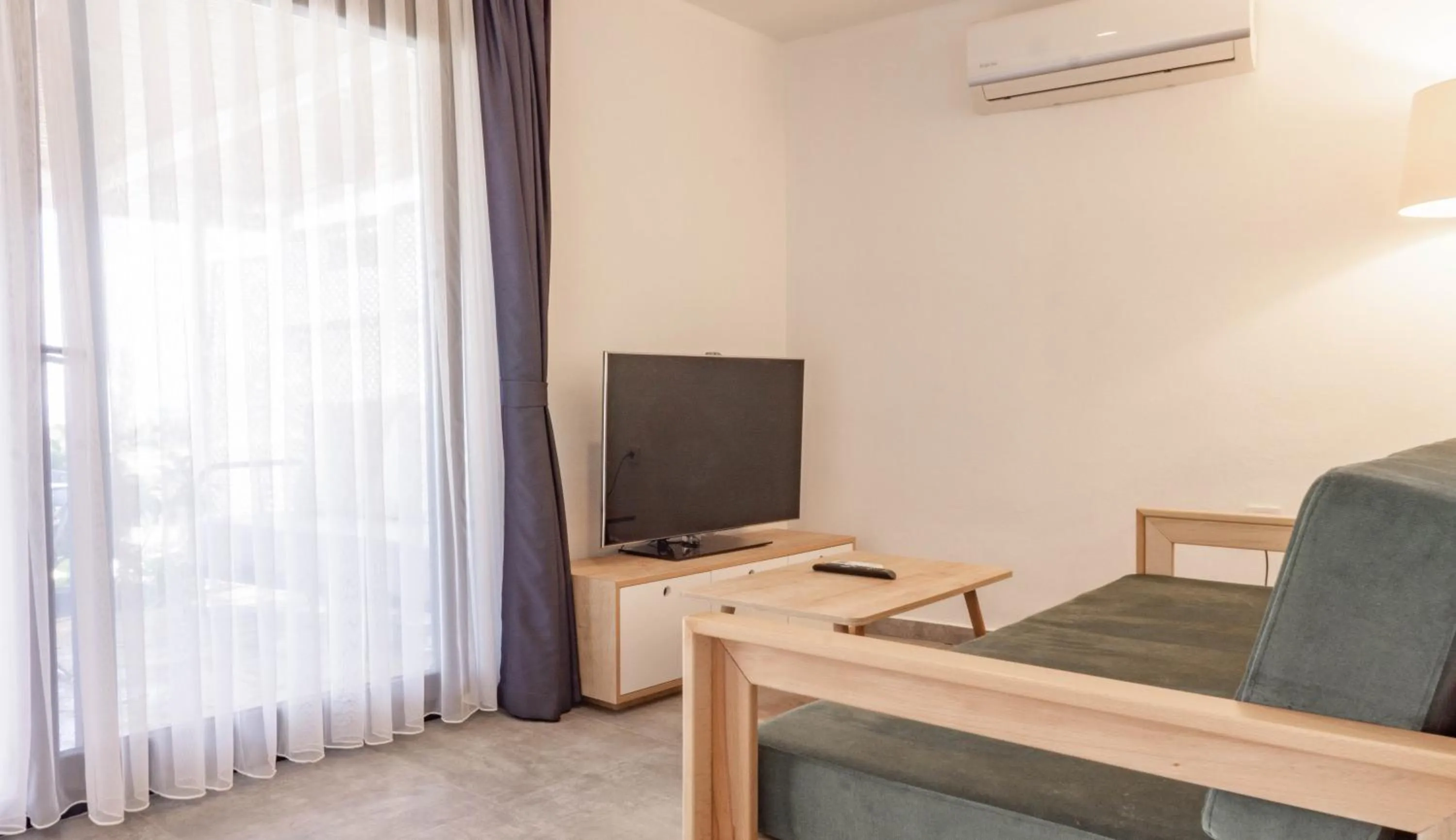 Living room in Daphnis Hotel