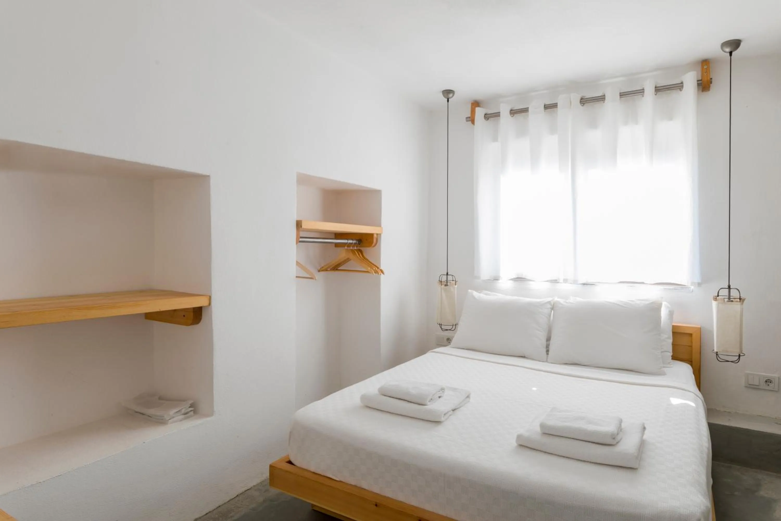 Bed in Daphnis Hotel