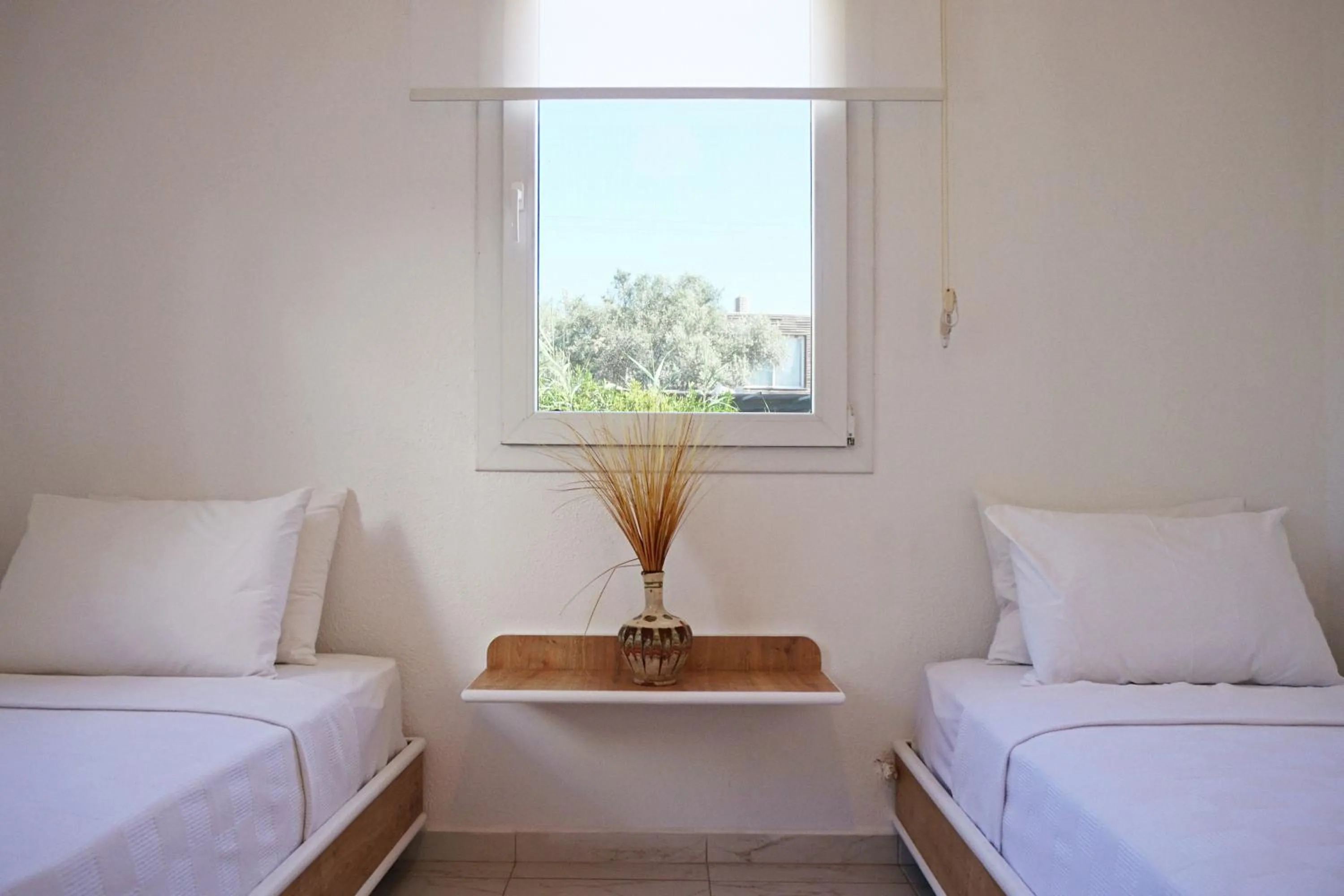 Bed in Daphnis Hotel