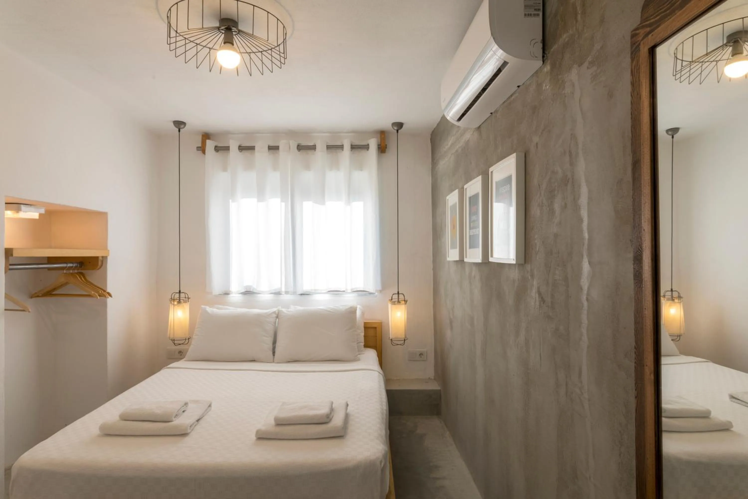 Bed in Daphnis Hotel