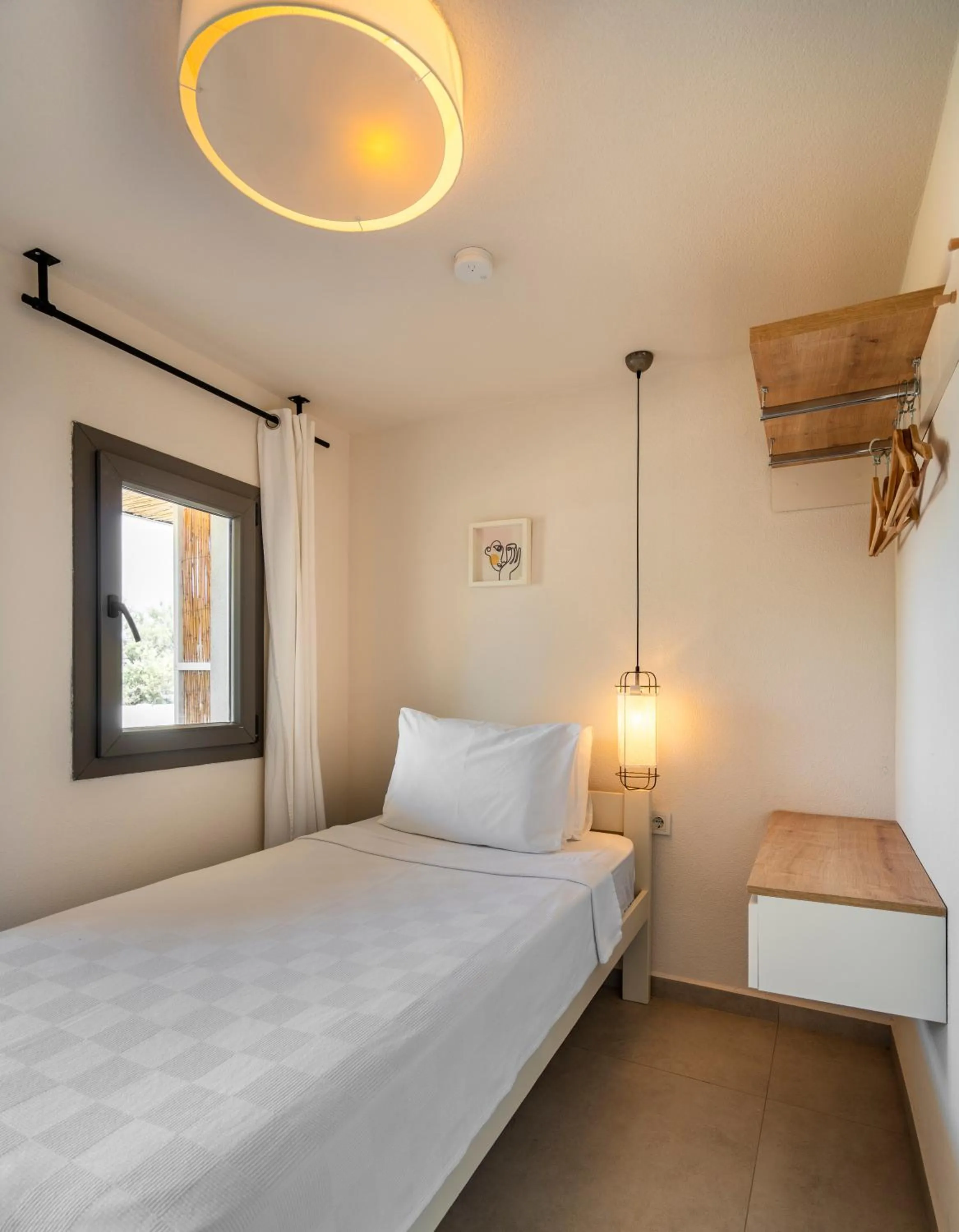 Bed in Daphnis Hotel