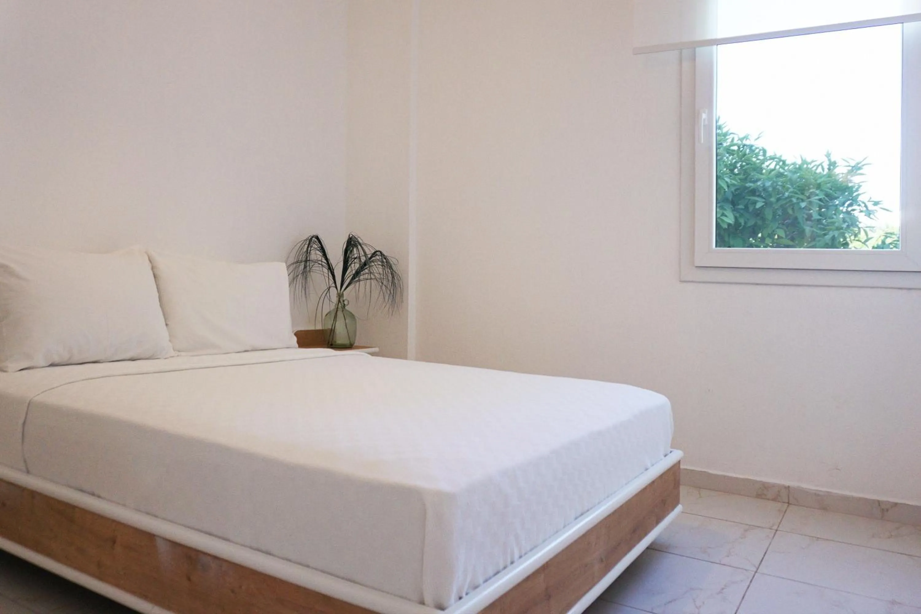 Bed in Daphnis Hotel