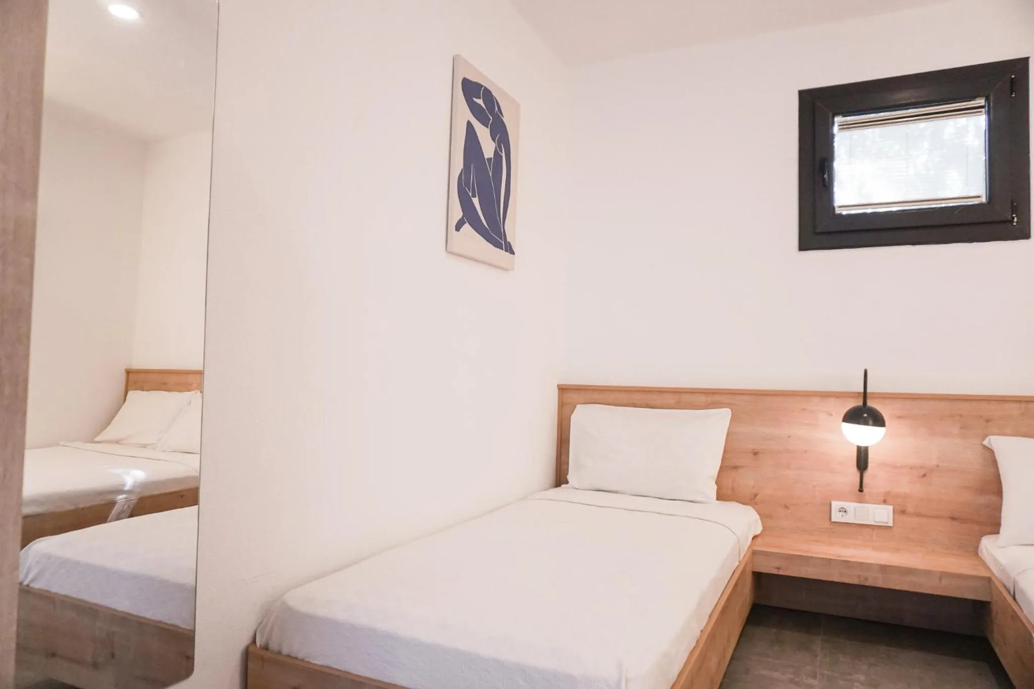 Bed in Daphnis Hotel