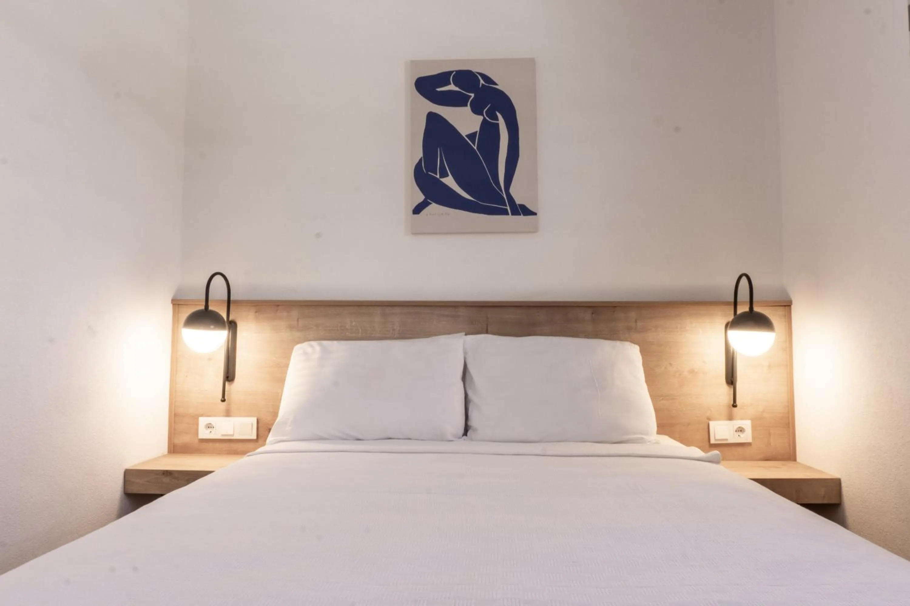 Bed in Daphnis Hotel