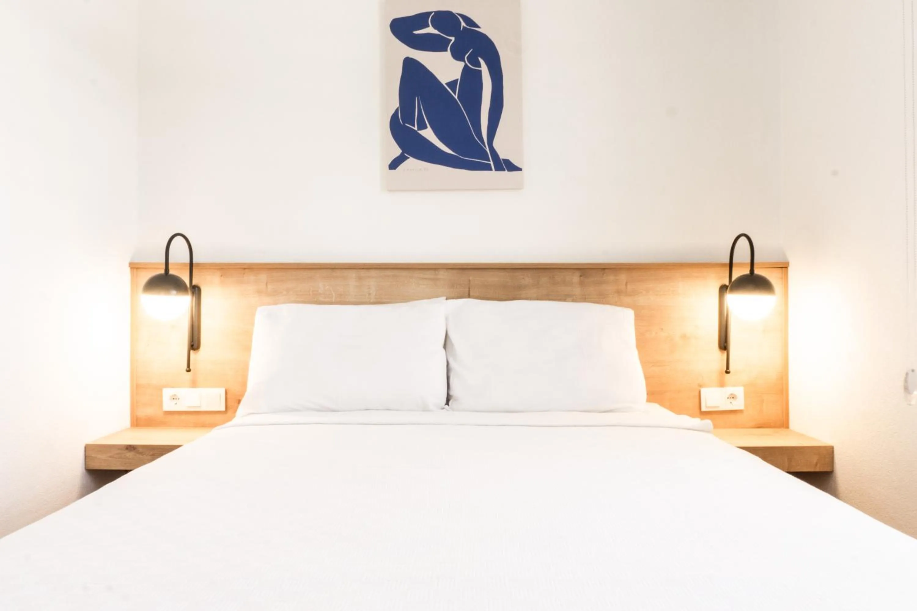 Bed in Daphnis Hotel