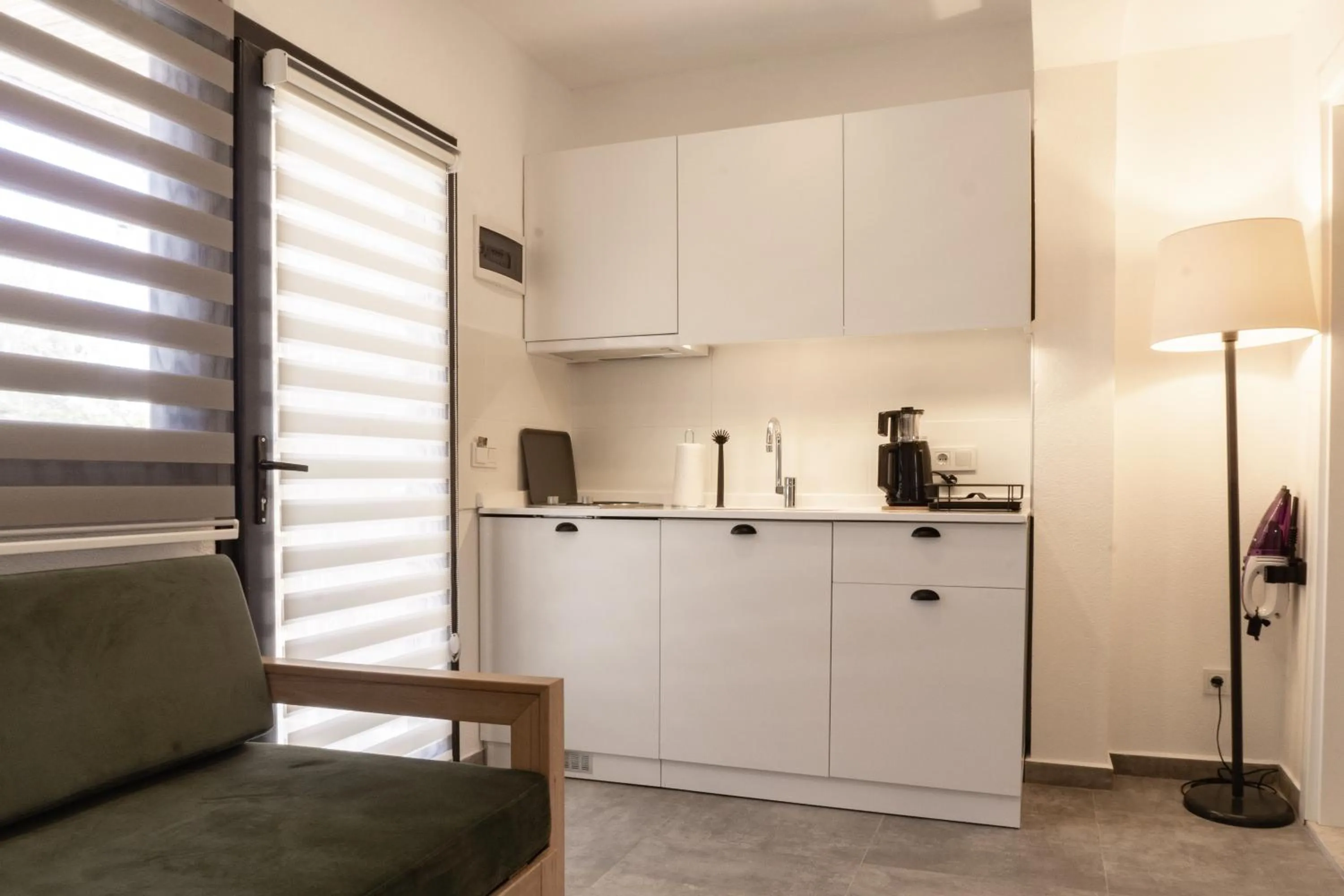 Kitchen or kitchenette in Daphnis Hotel