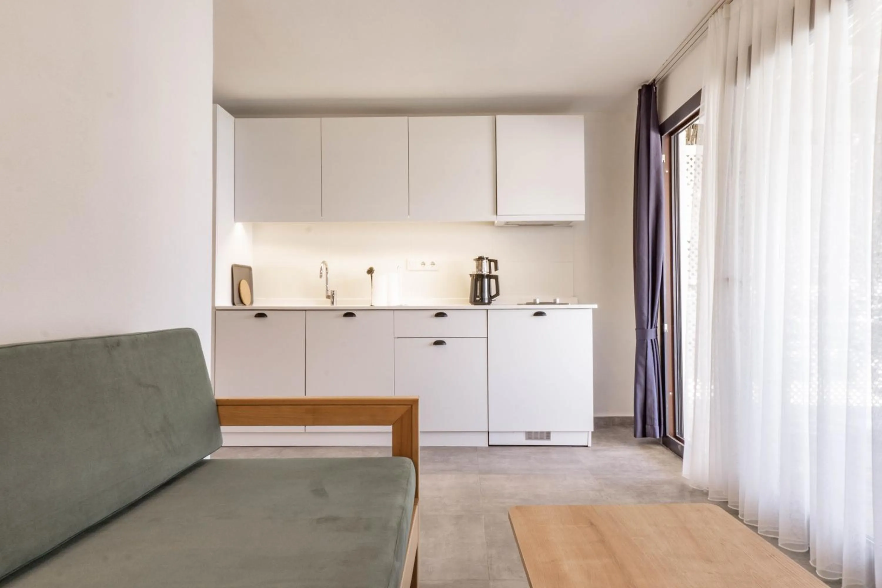 Kitchen or kitchenette in Daphnis Hotel
