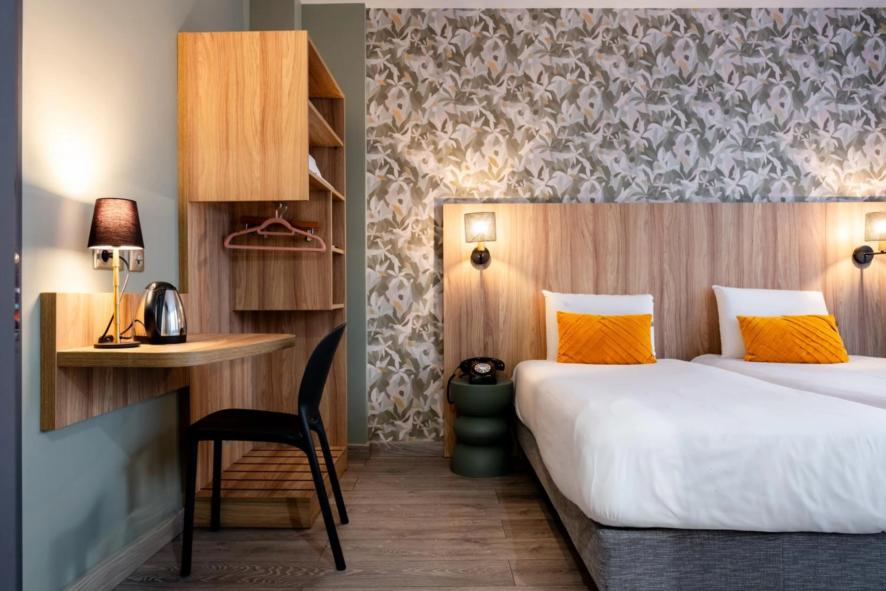 Bed in Kyriad Paris 10 - Canal Saint Martin - République