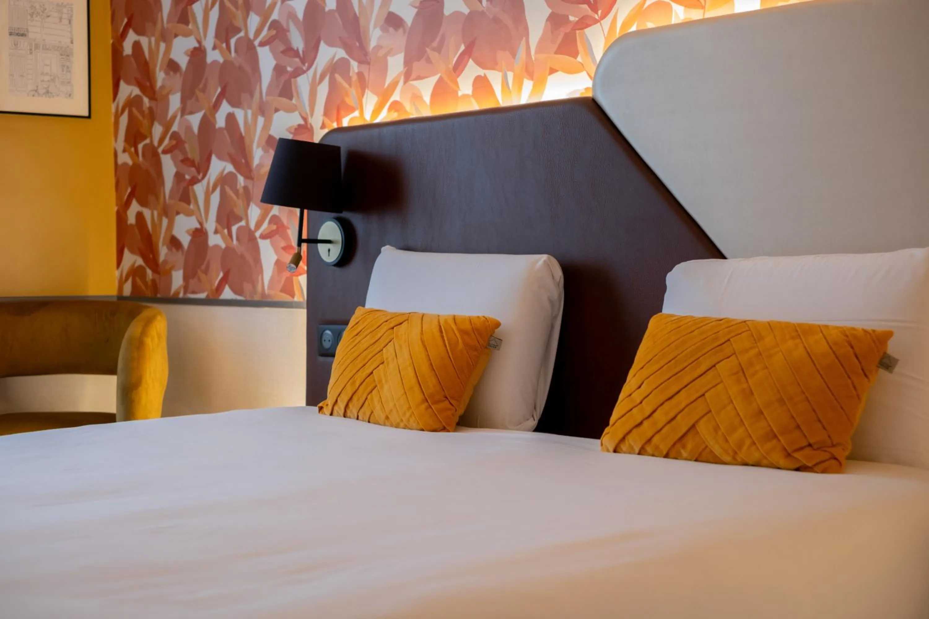 Bed in Kyriad Paris 10 - Canal Saint Martin - République