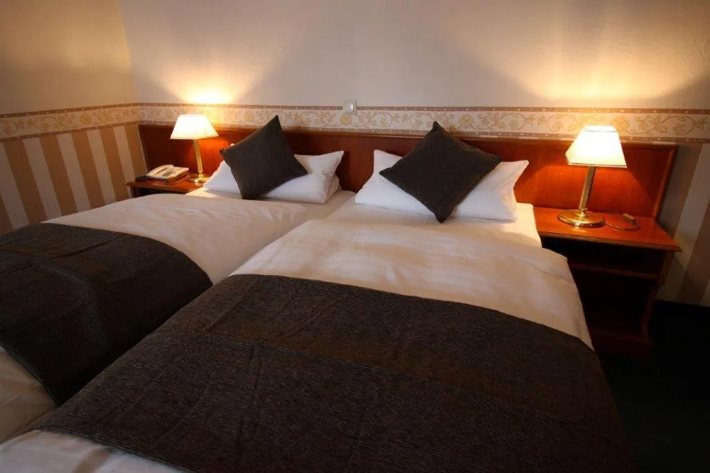 Photo of the whole room, Bed in Hotel Burg-Mühle