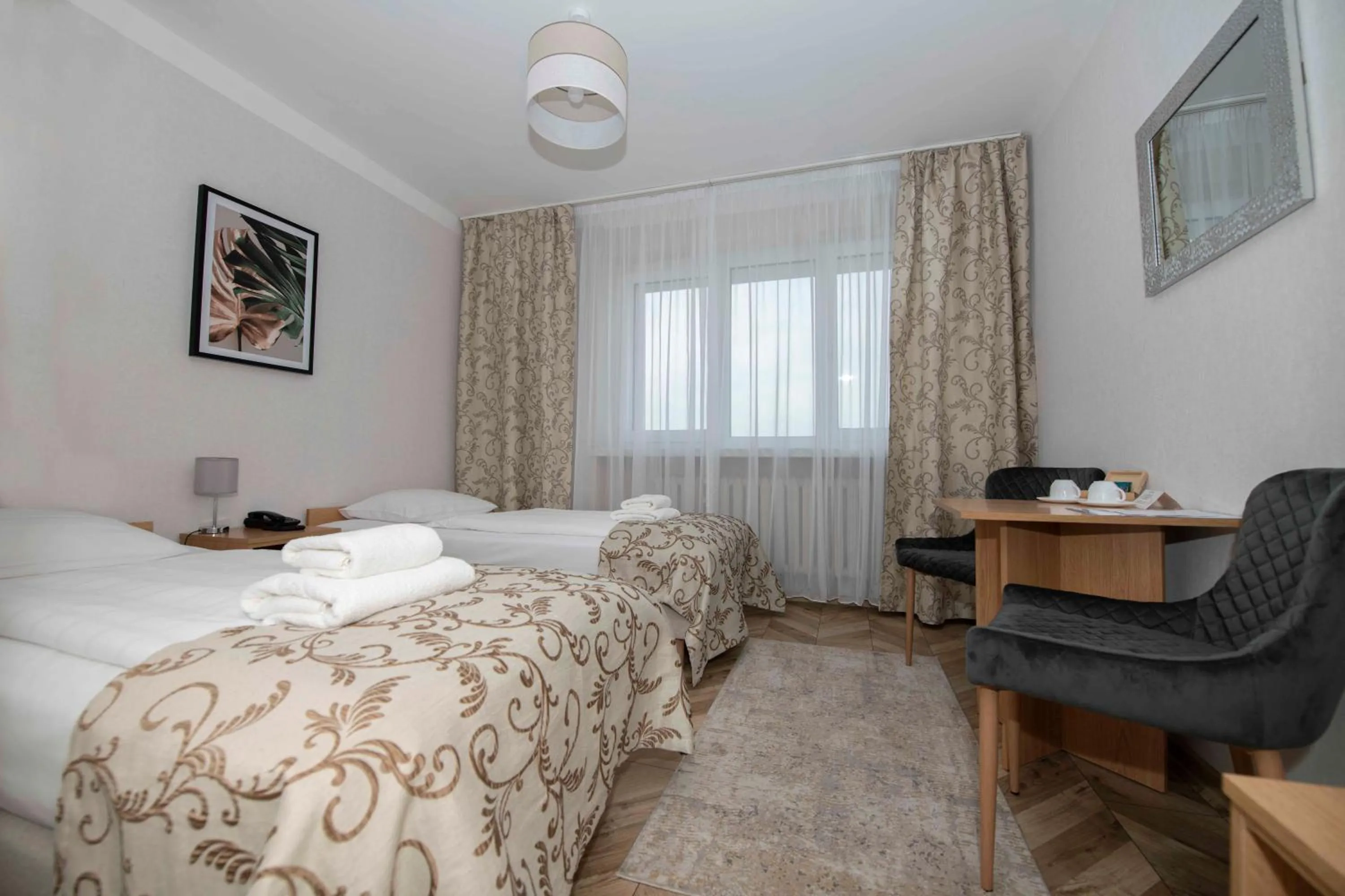 Seating area, Bed in Hotel Polonia