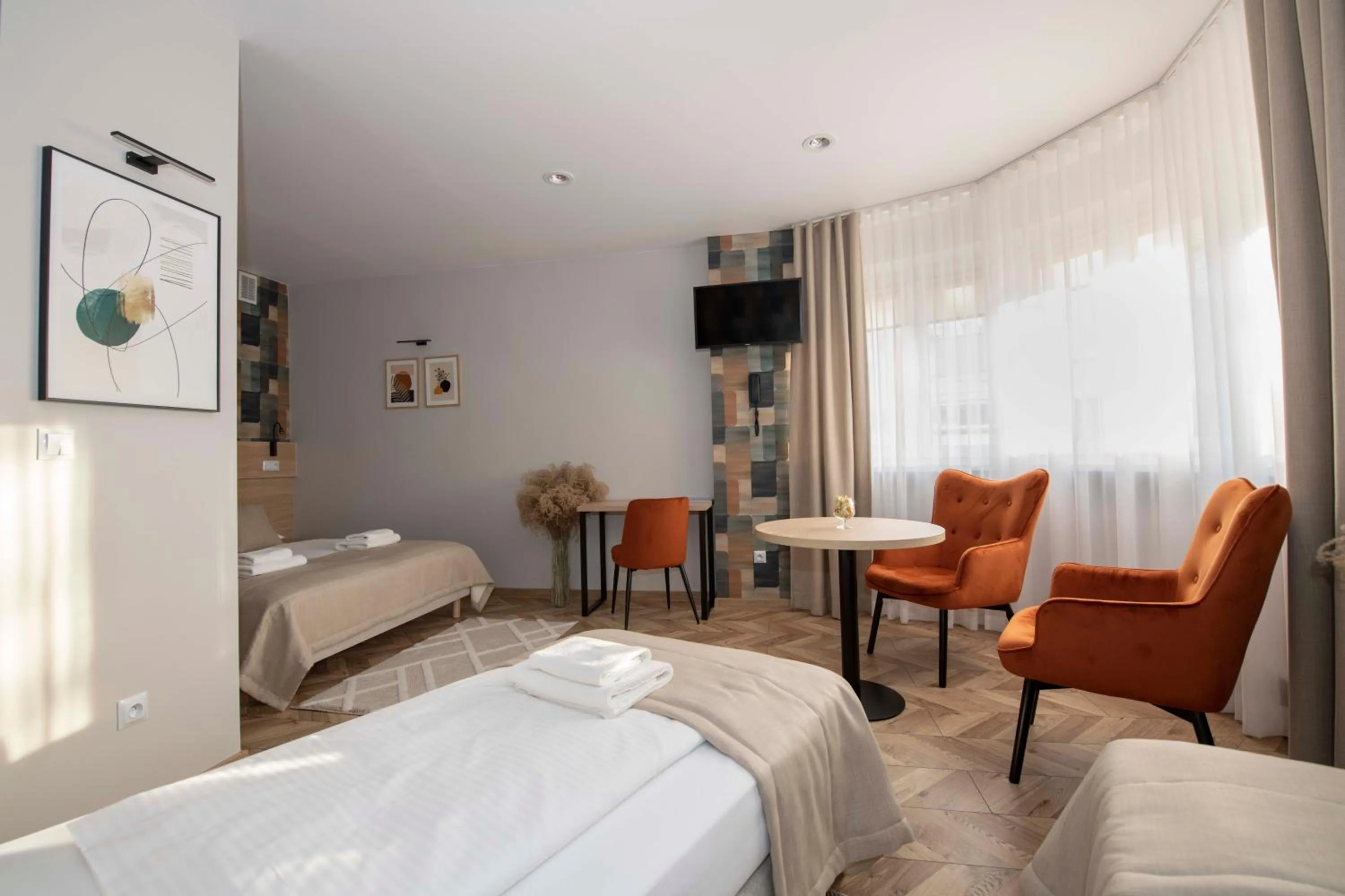 Seating area, Bed in Hotel Polonia