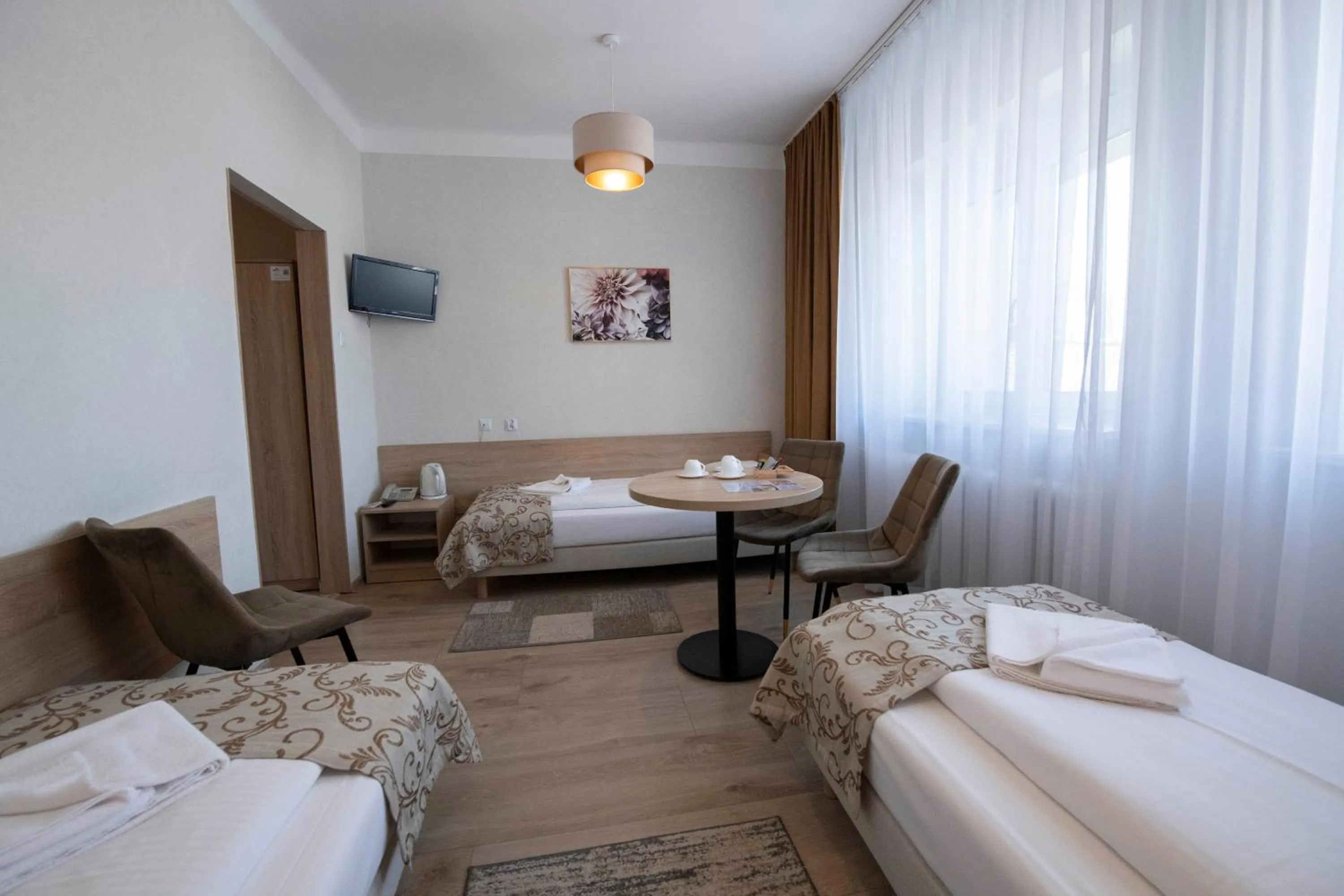 Seating area, Bed in Hotel Polonia