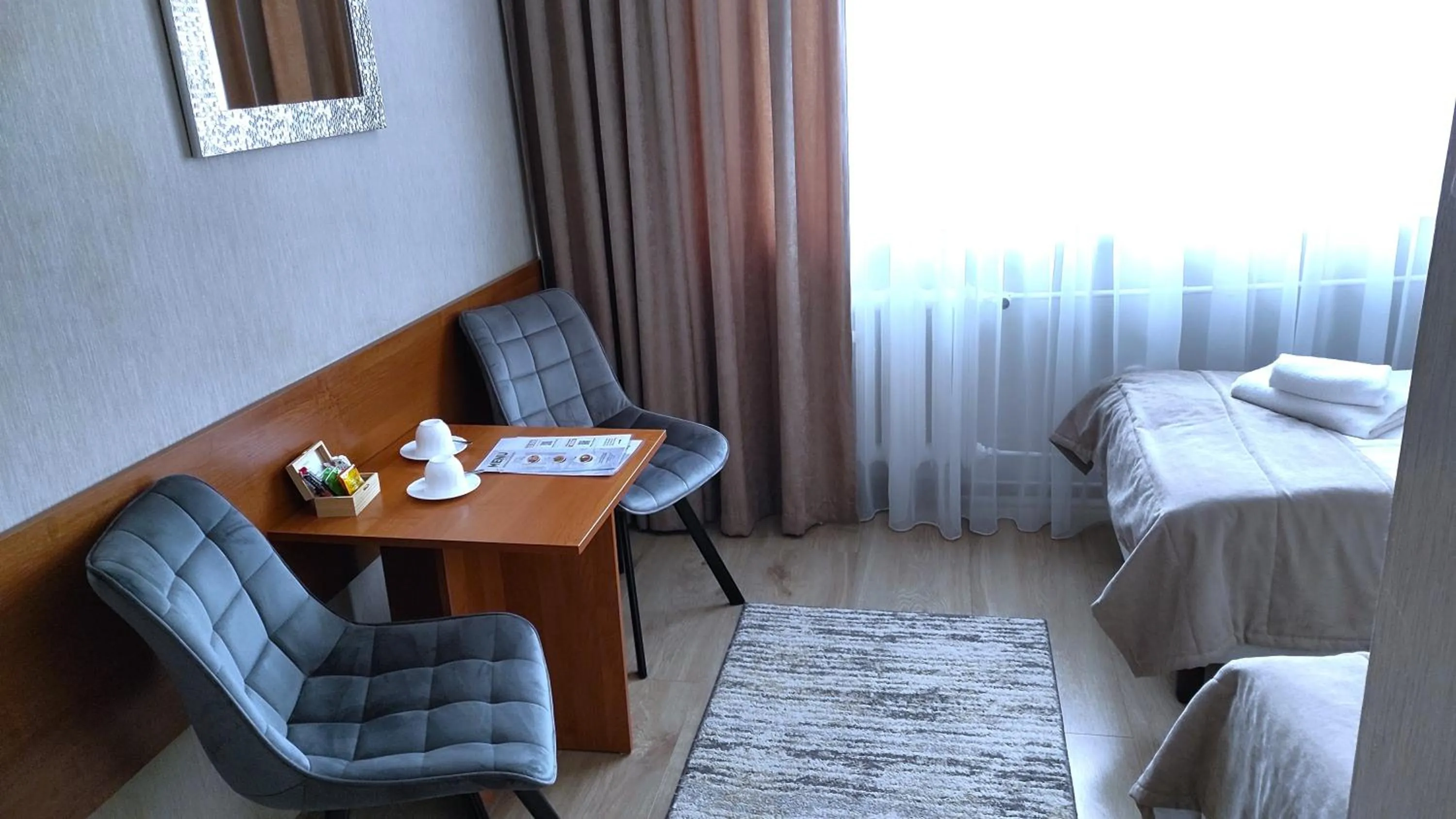 Seating area, Bed in Hotel Polonia