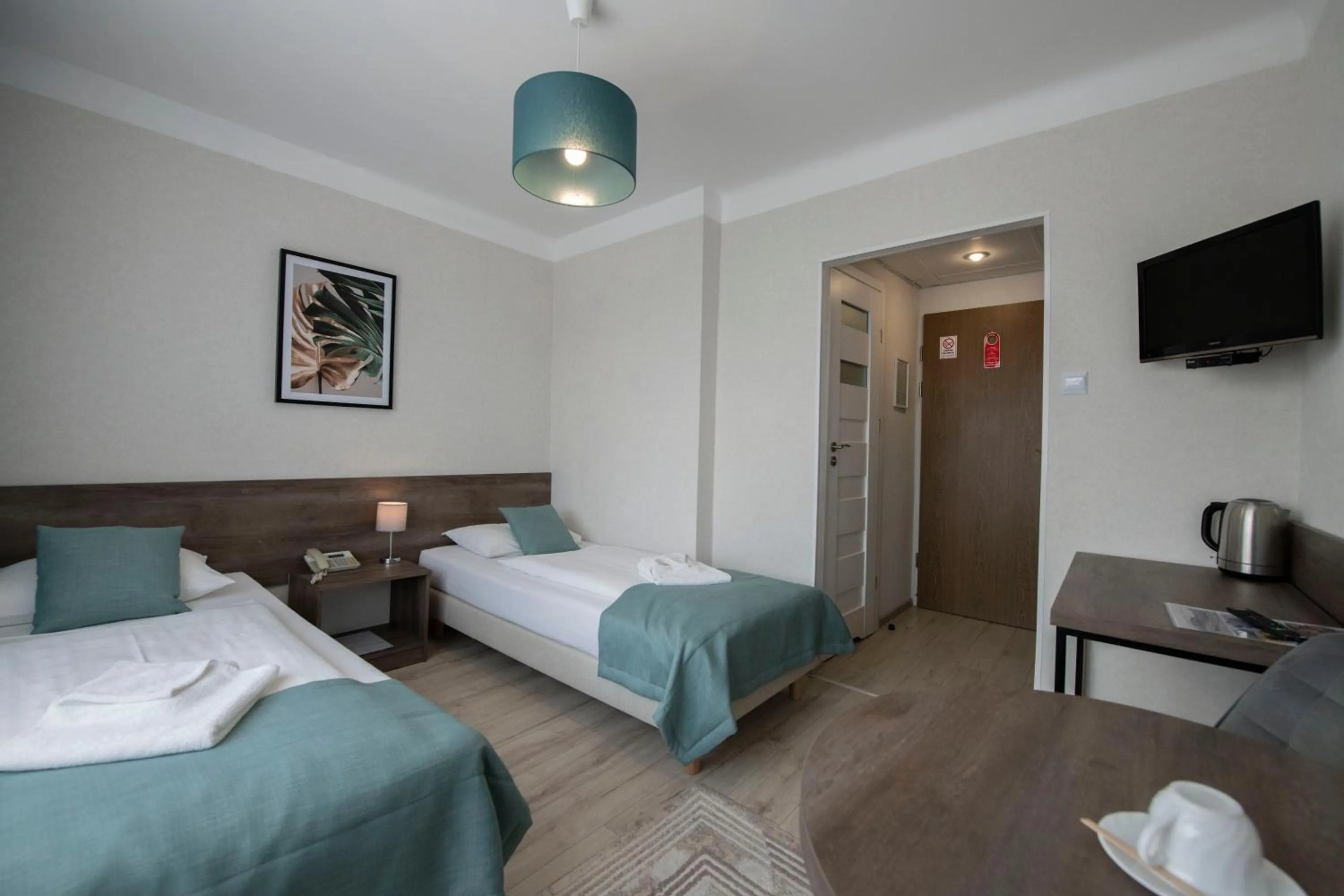 Seating area, Bed in Hotel Polonia