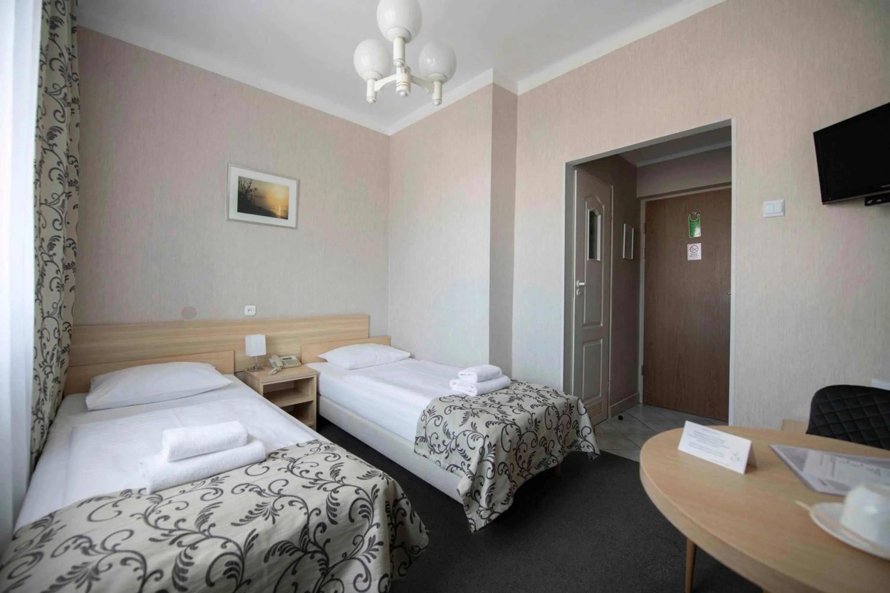 Seating area, Bed in Hotel Polonia