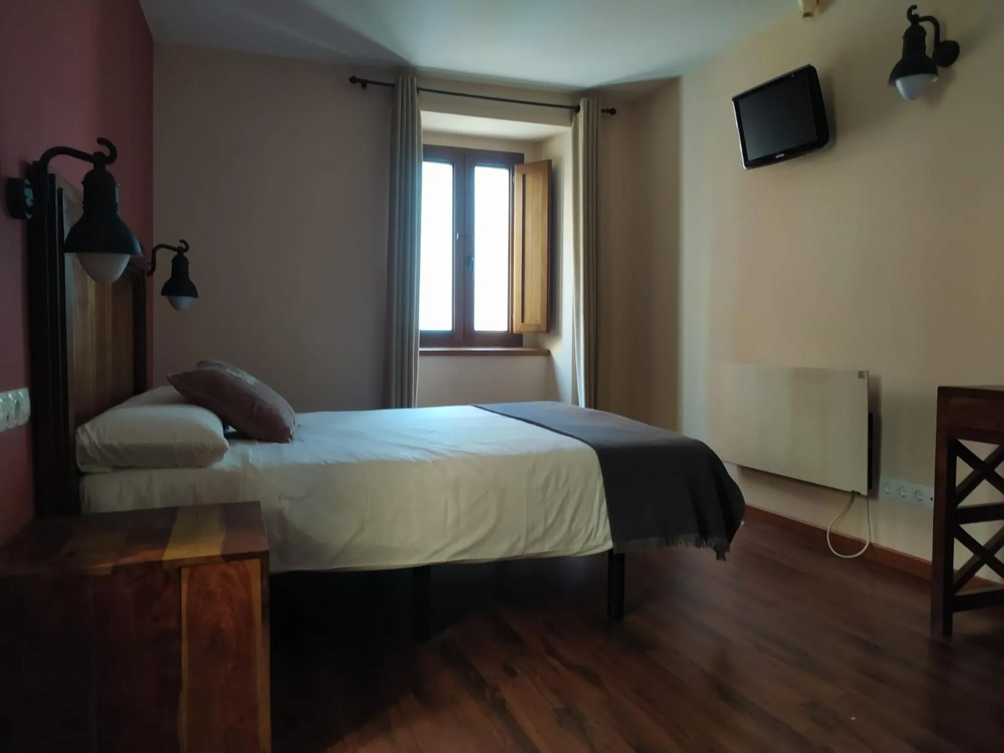 Bed in Hotel Cabo Ortegal