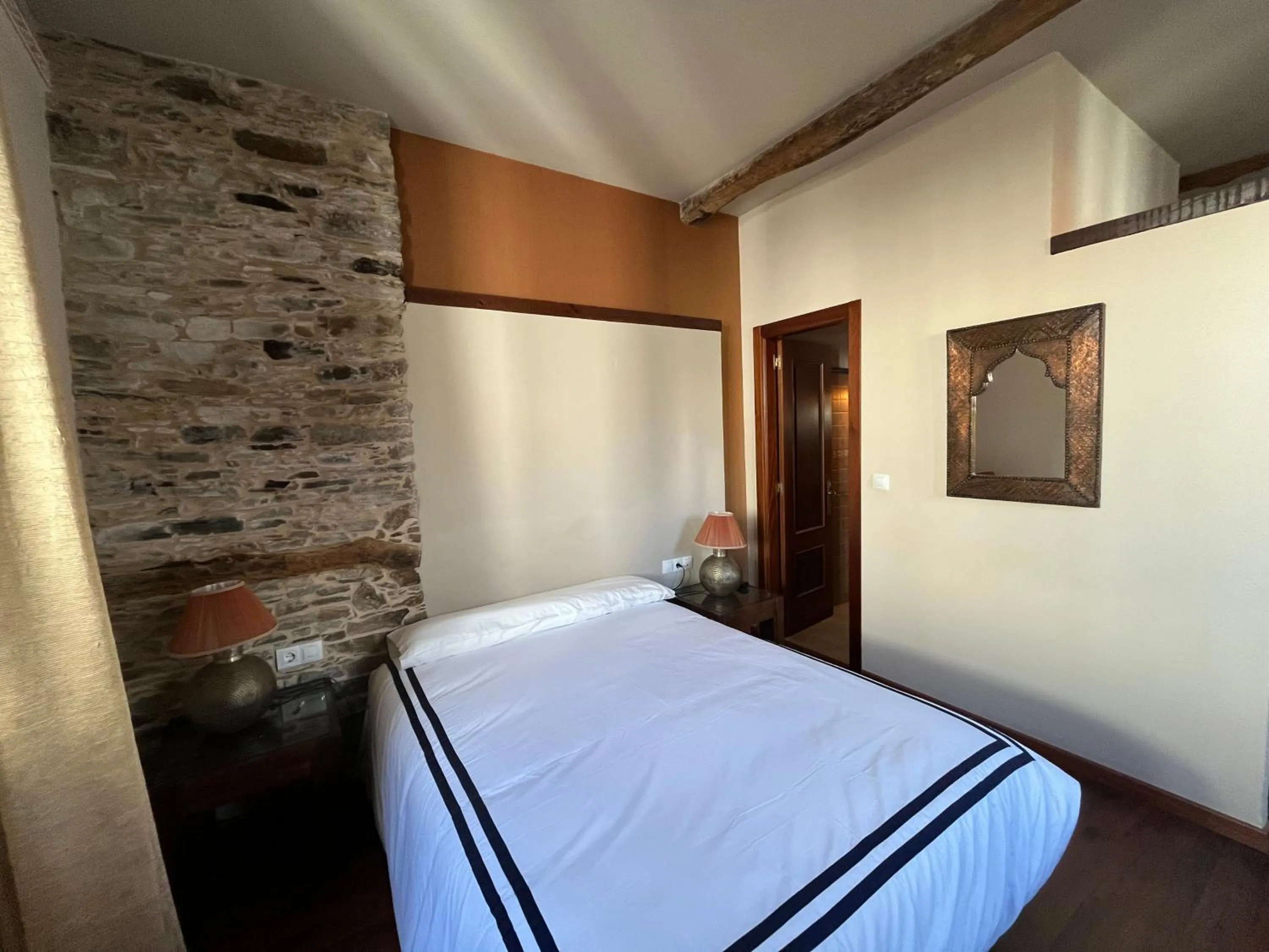 Bed in Hotel Cabo Ortegal